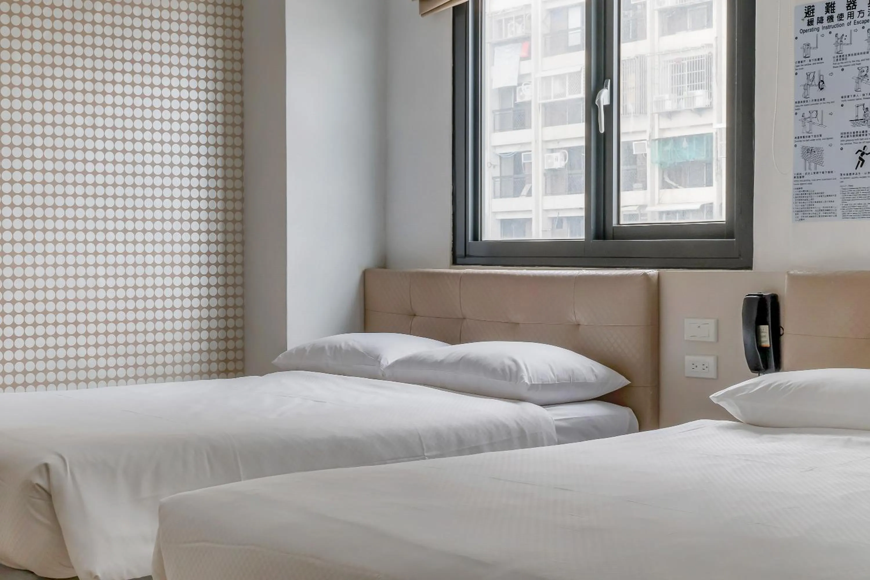 Bed in CHECK inn Express Kaohsiung Love River