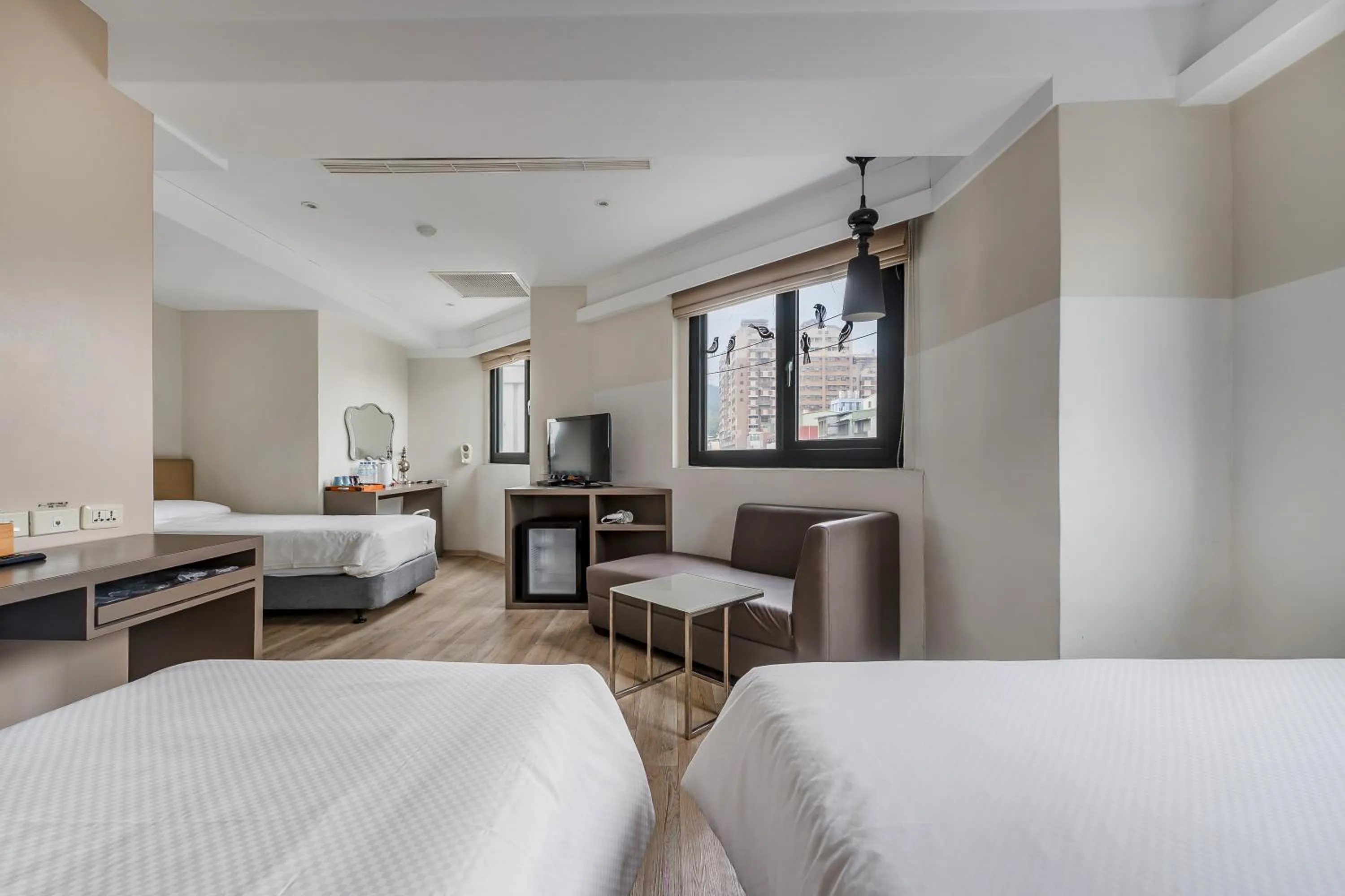 Bed in CHECK inn Express Kaohsiung Love River