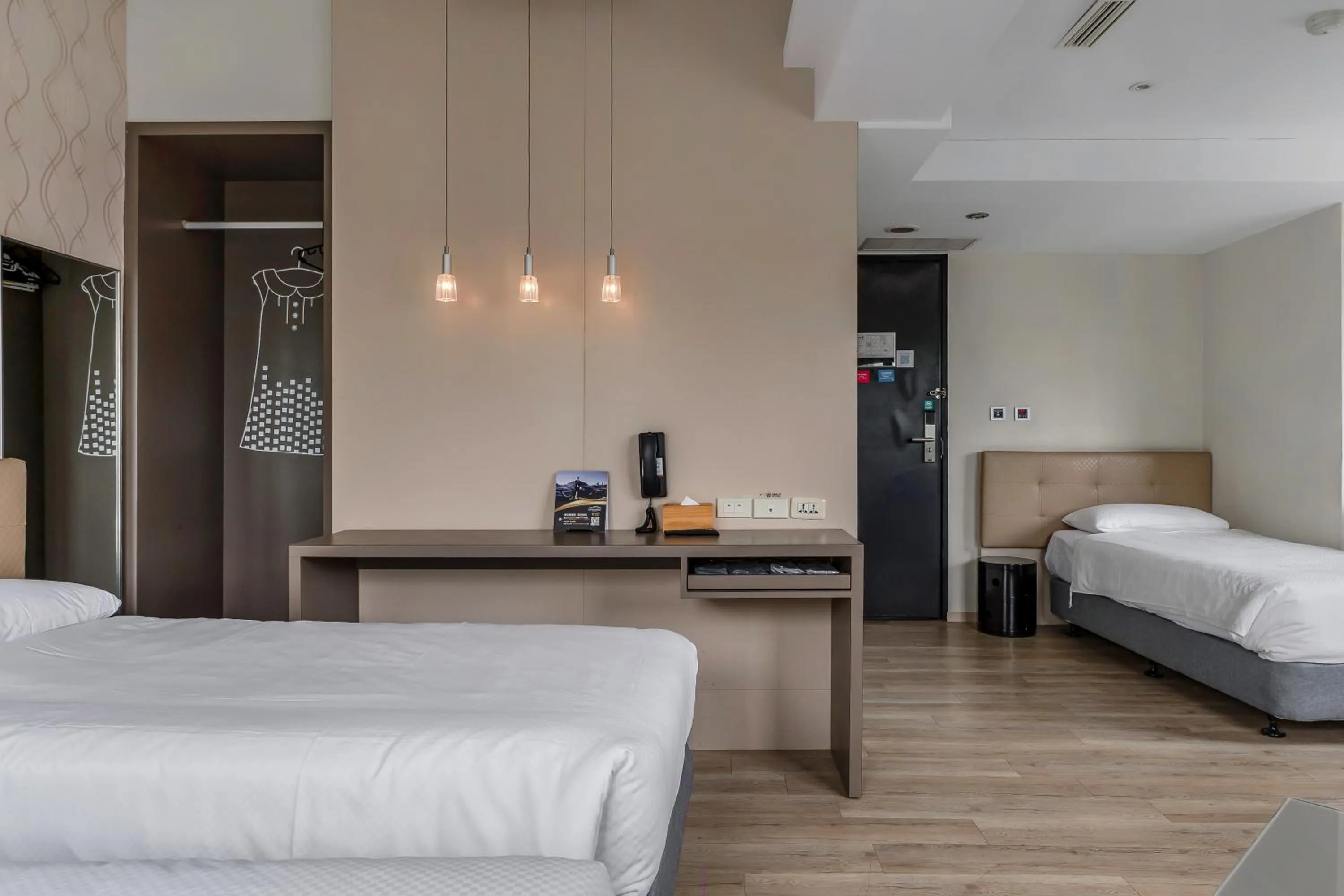 Bed in CHECK inn Express Kaohsiung Love River