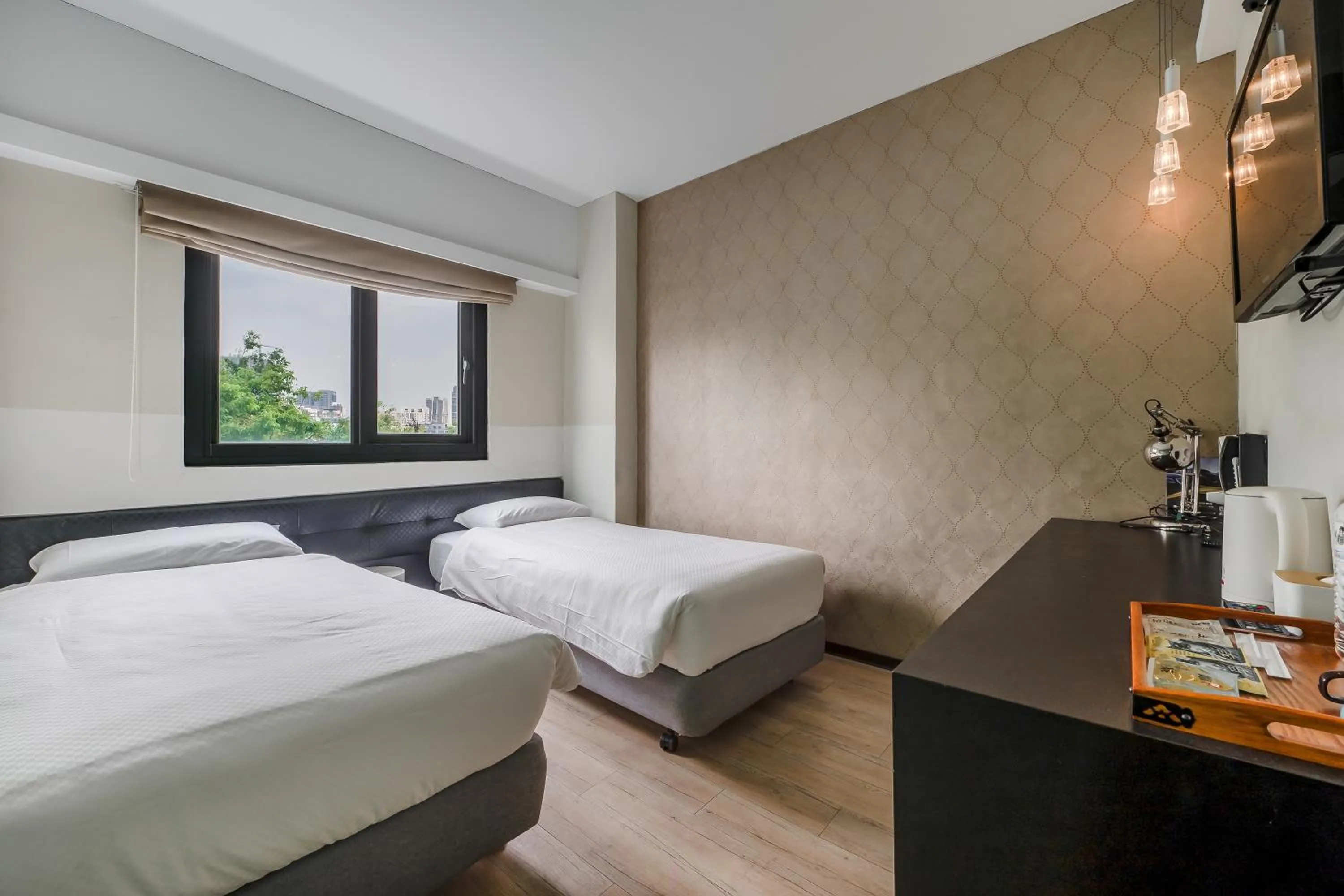 Bed in CHECK inn Express Kaohsiung Love River