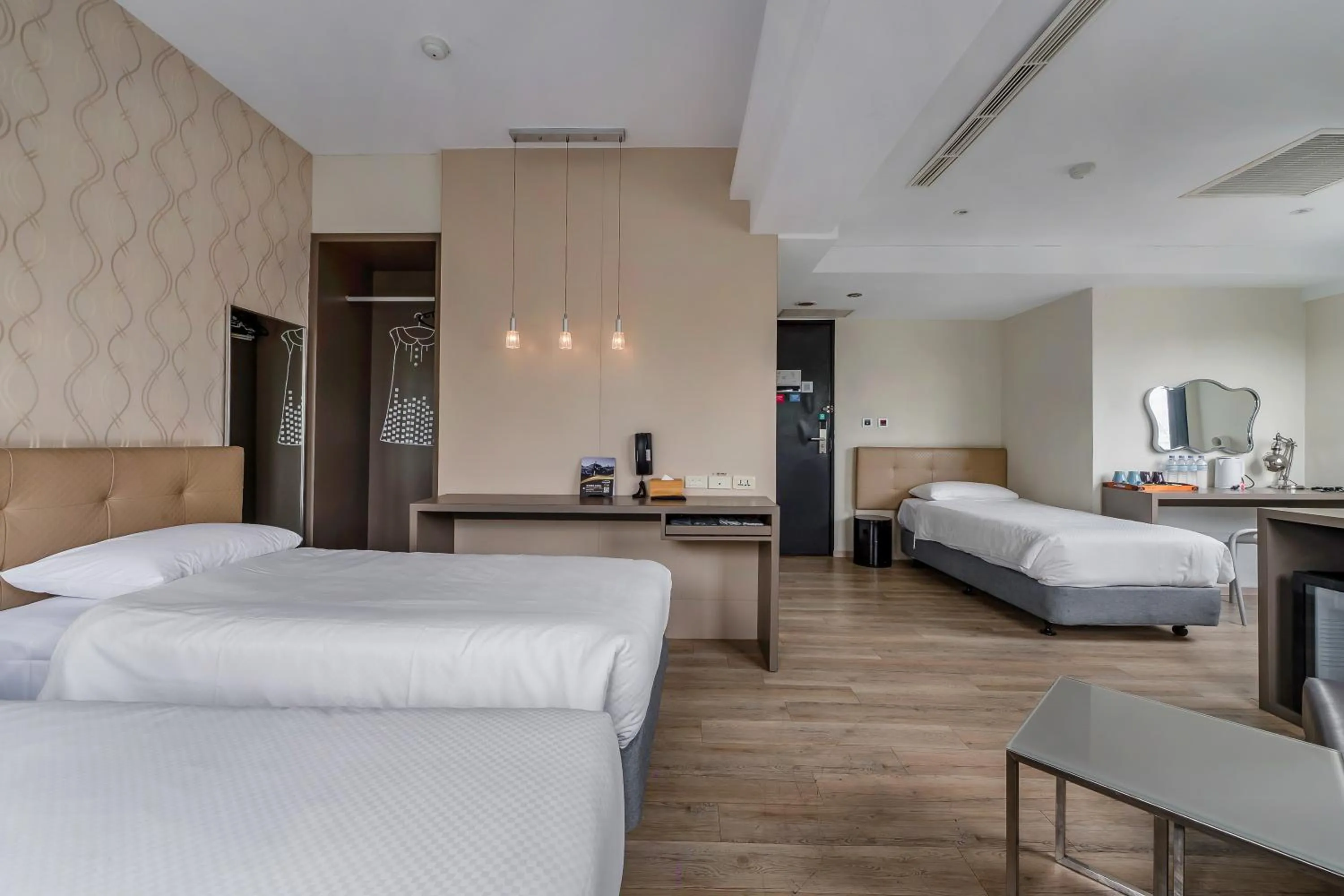 Bed in CHECK inn Express Kaohsiung Love River