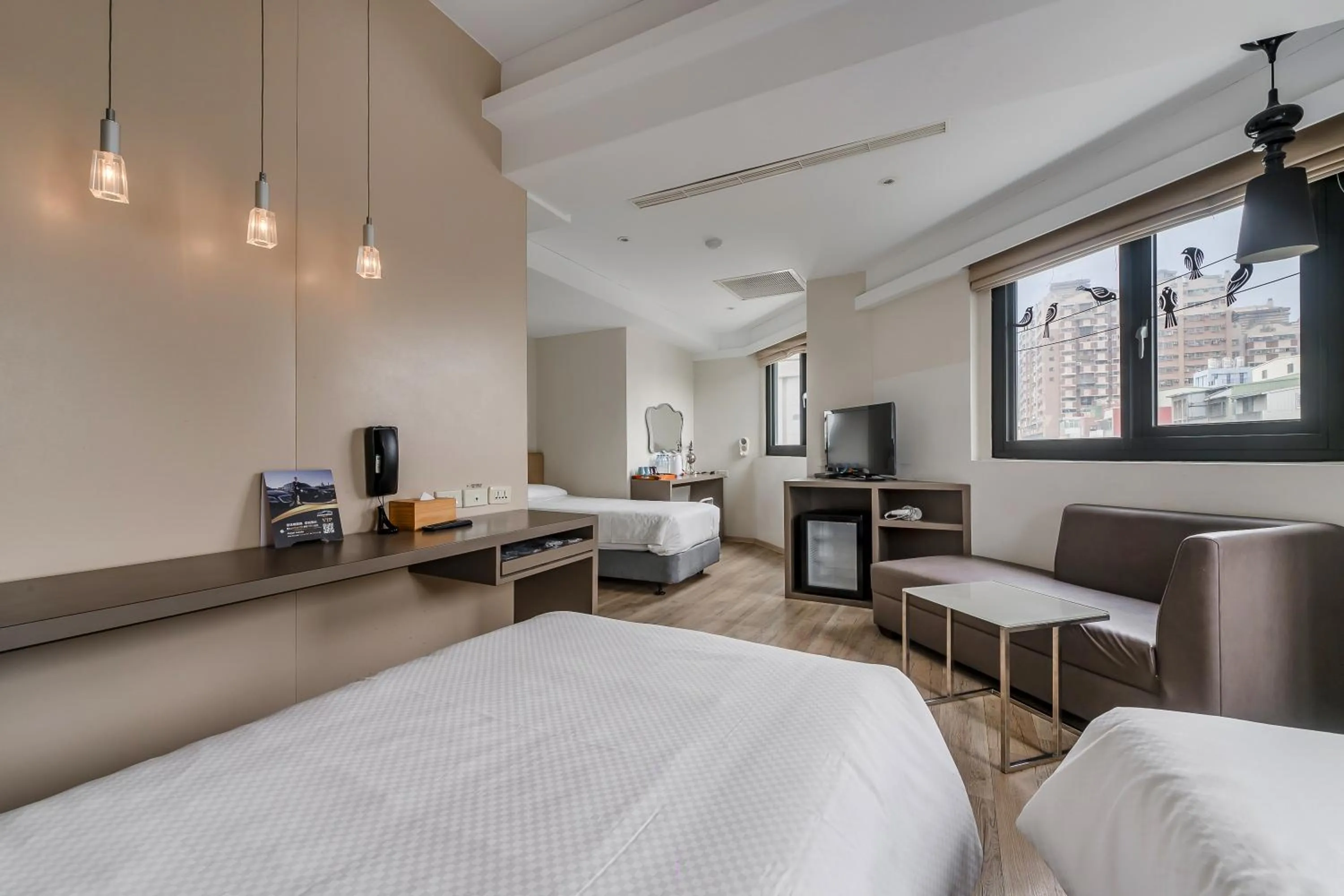 Bed in CHECK inn Express Kaohsiung Love River