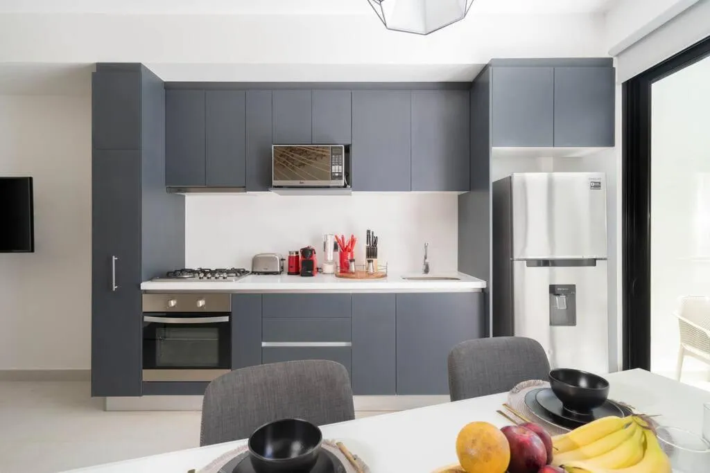 Kitchen or kitchenette in SunsetviewPH+PrivPool+Near Beach&Town+Rooftop+50mb
