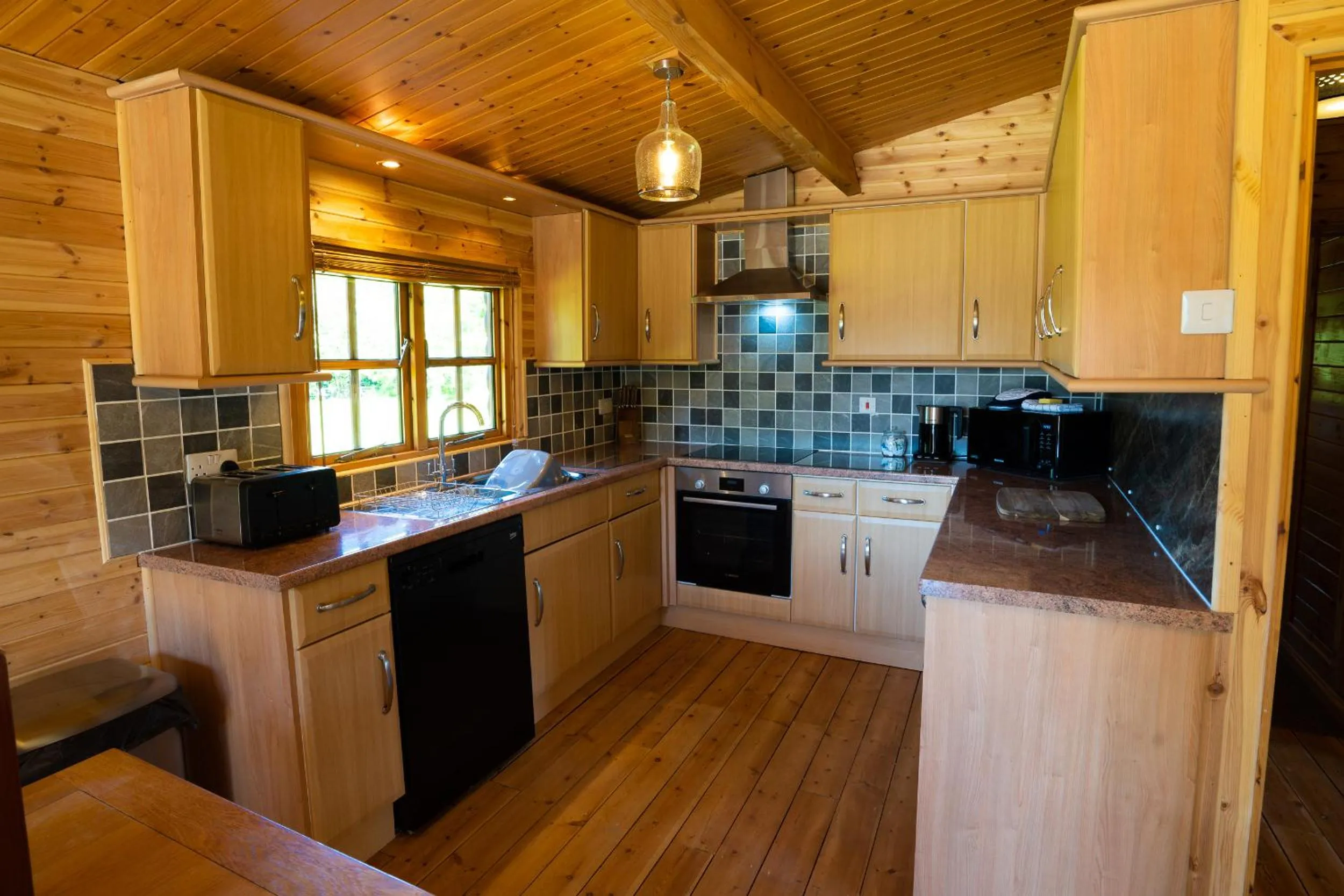 Kitchen or kitchenette in Wall Eden Farm - Luxury Log Cabins and Glamping