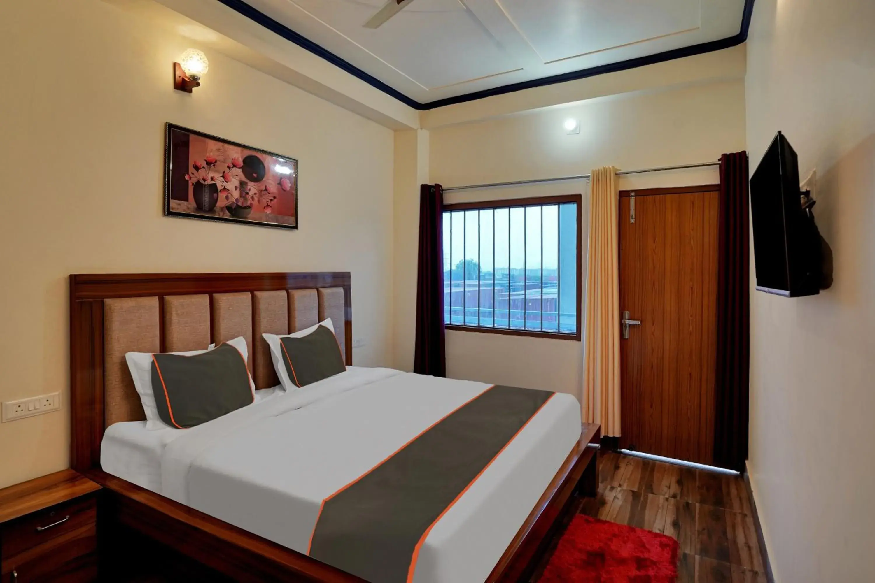 Bedroom in Collection O Trihans Mantion Hotel Bedroom in Collection O Trihans Mantion Hotel