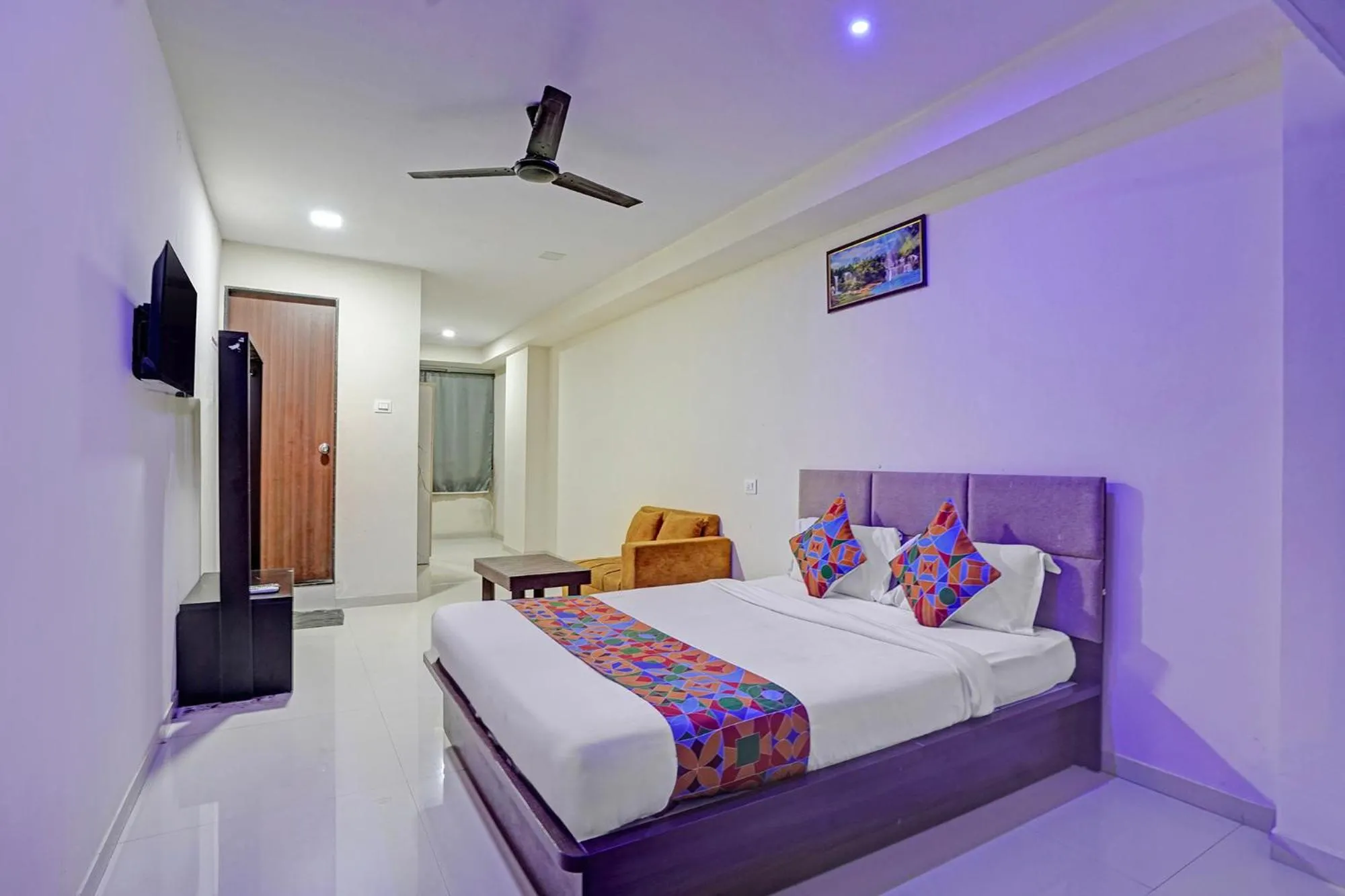 Bed in FabHotel RK Inn