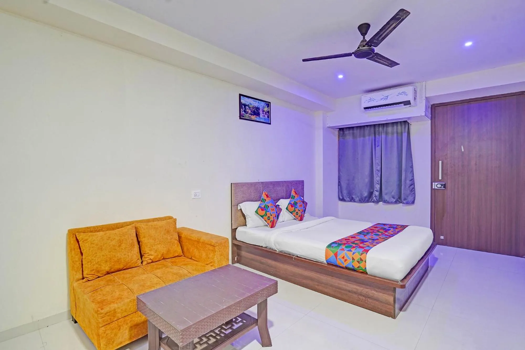 Bed in FabHotel RK Inn