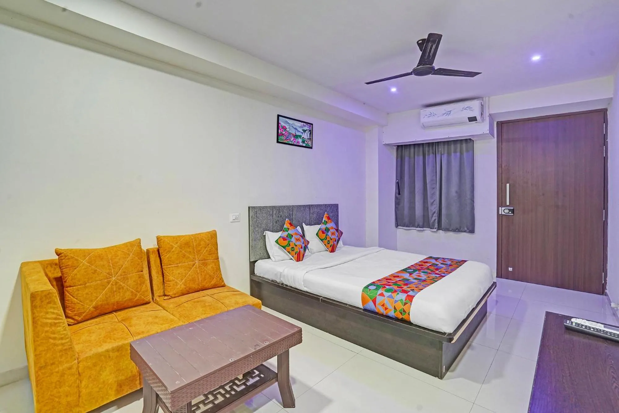 Living room, Bed in FabHotel RK Inn