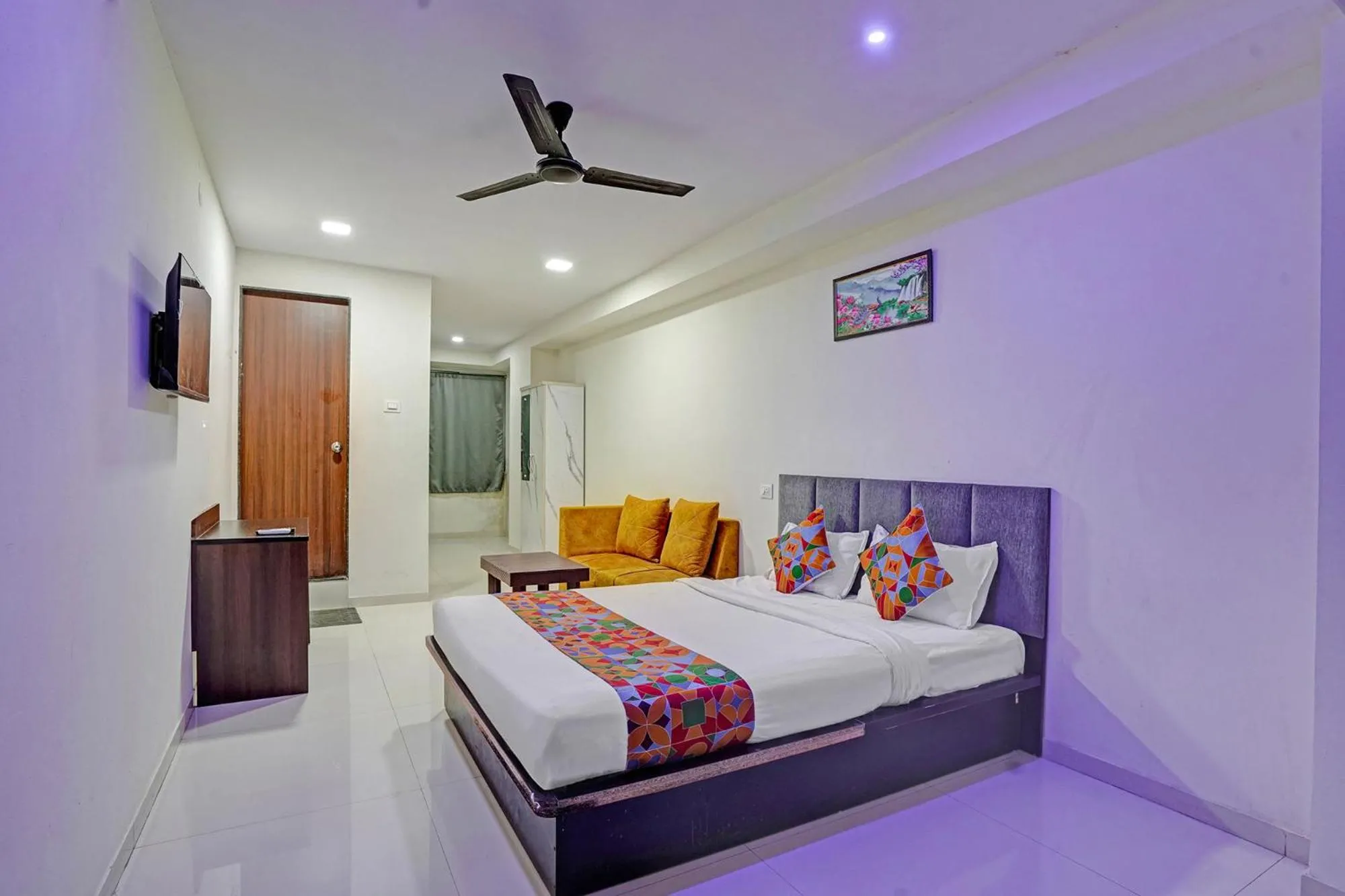 Bed in FabHotel RK Inn