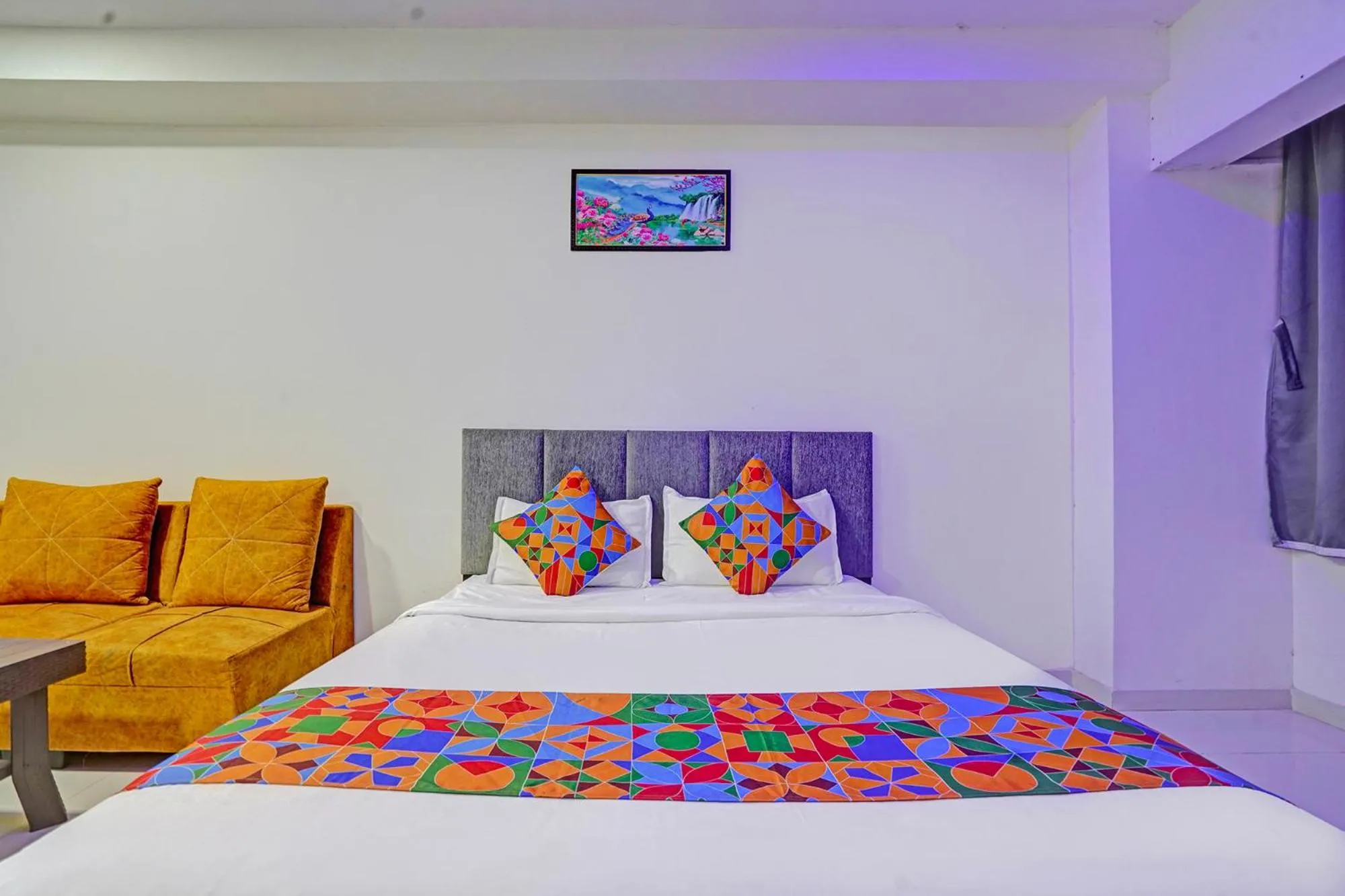 Bed in FabHotel RK Inn