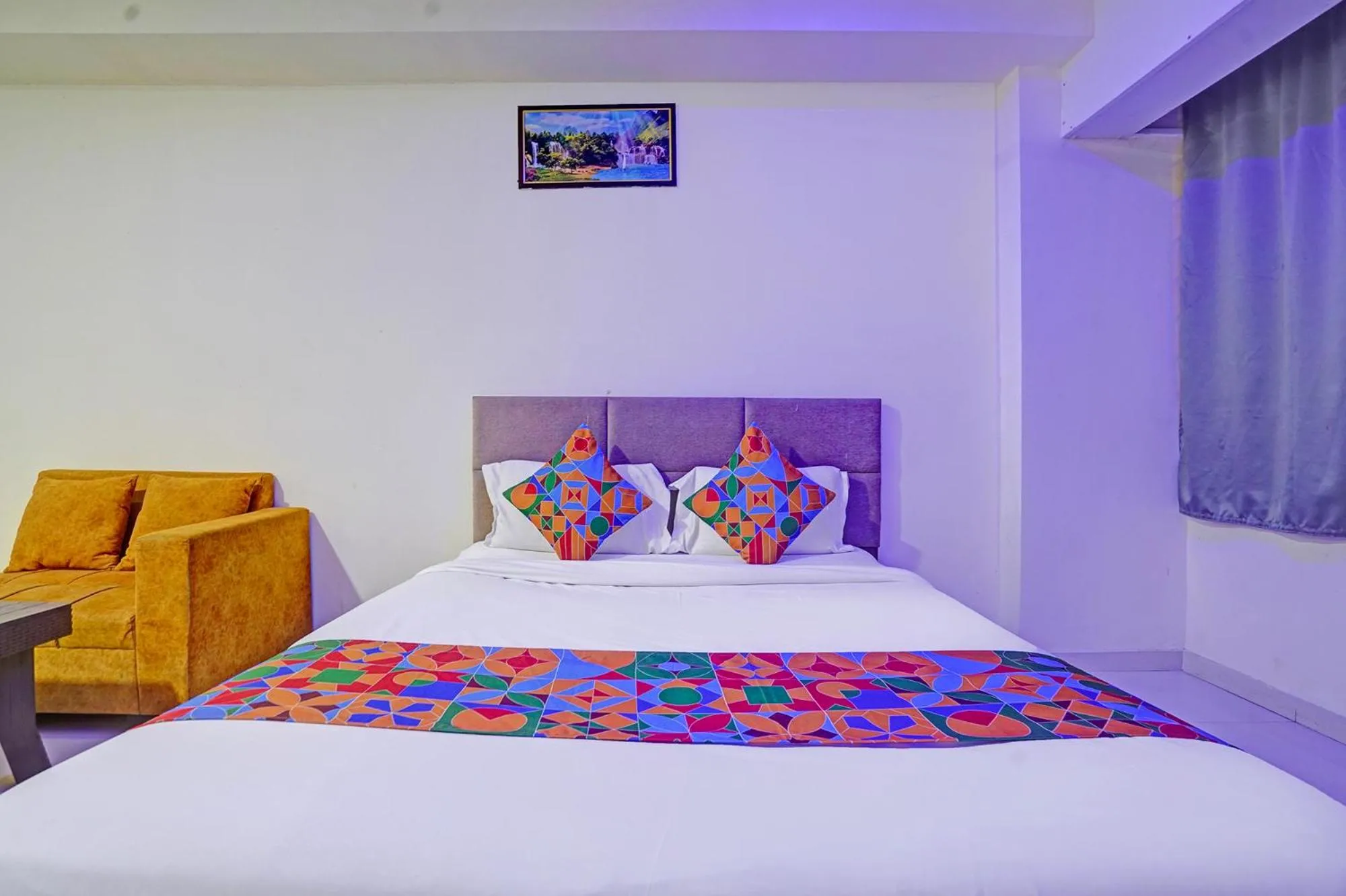 Bed in FabHotel RK Inn