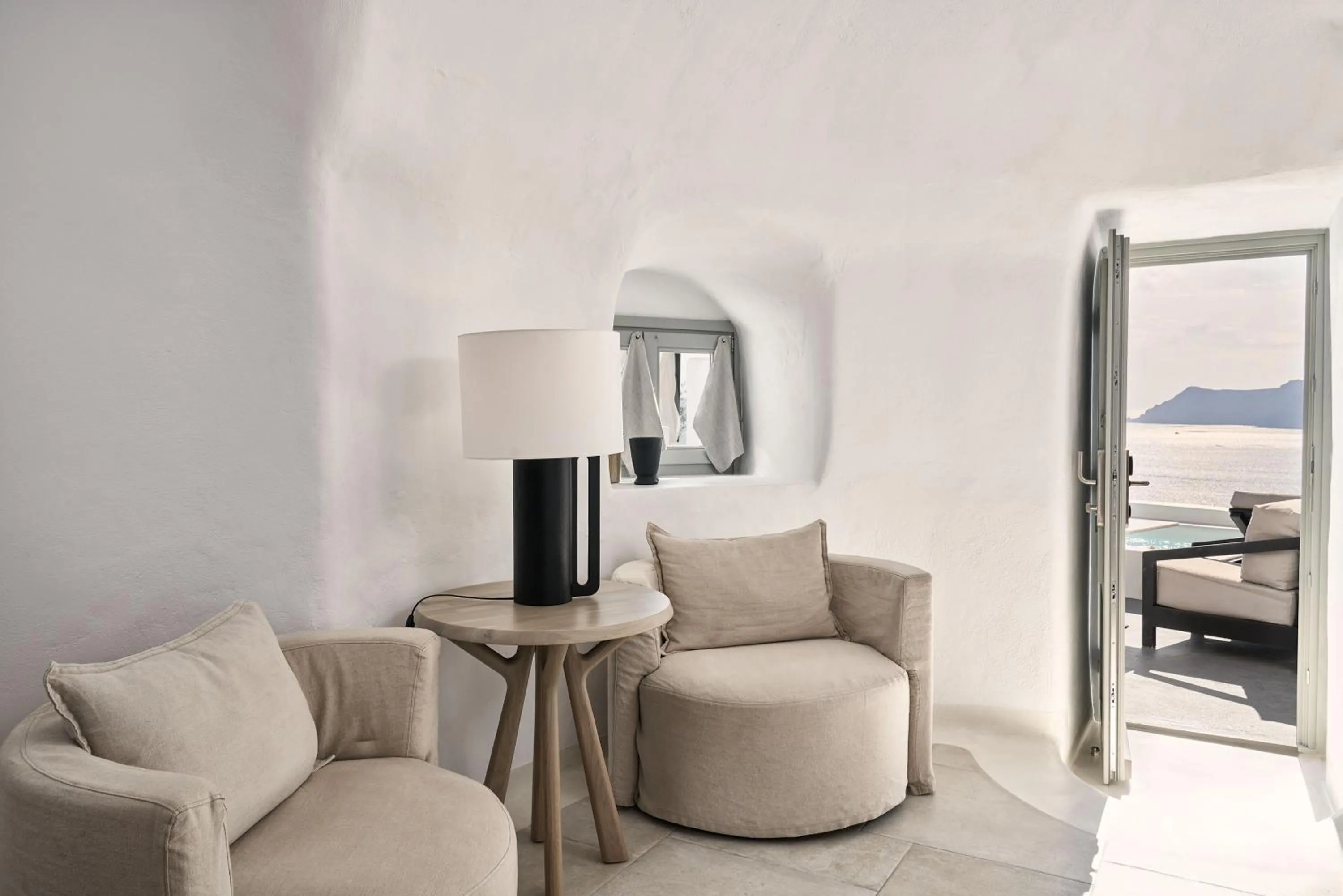 Seating area, Bed in Charisma Suites