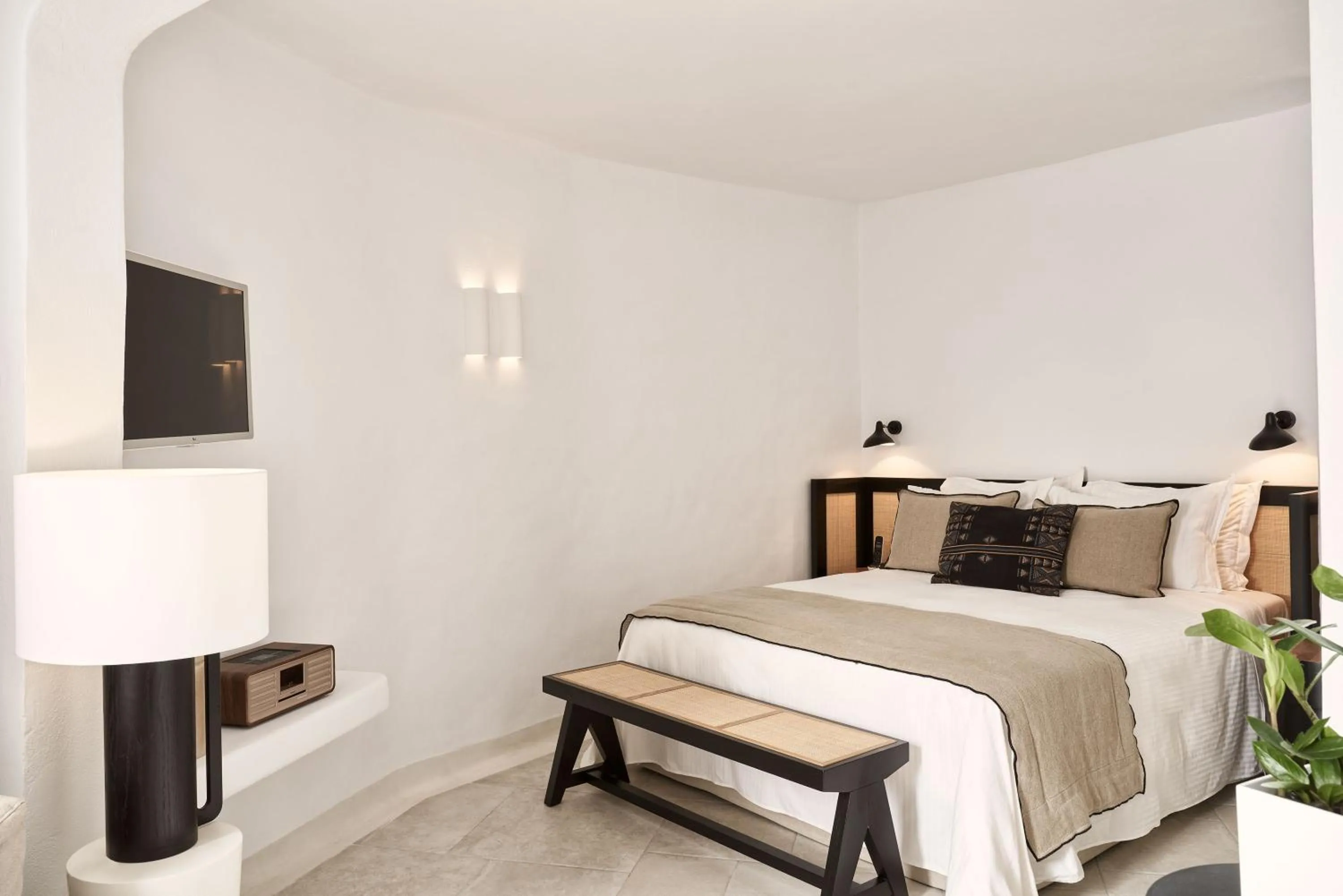 Bed in Charisma Suites