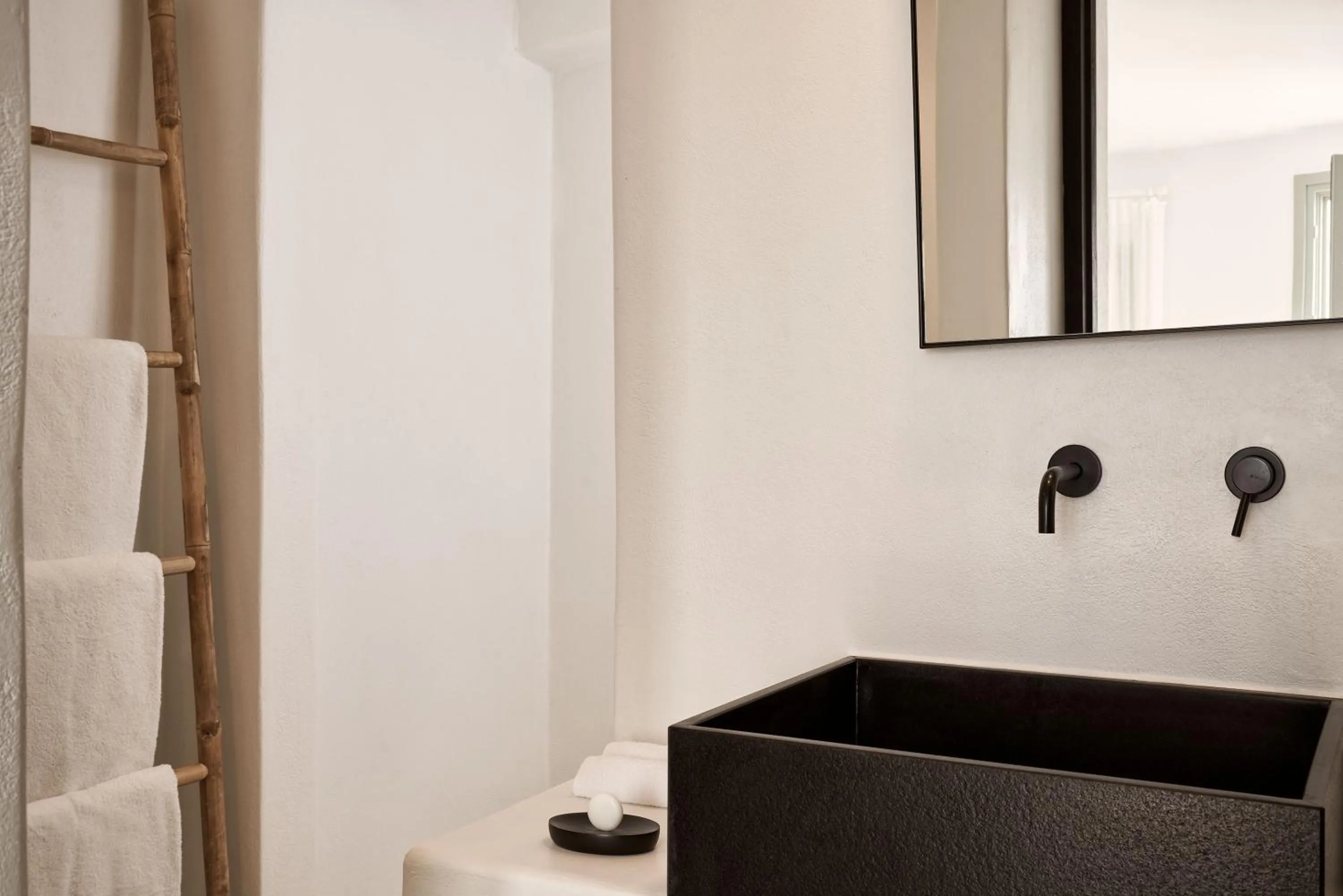 Bathroom in Charisma Suites