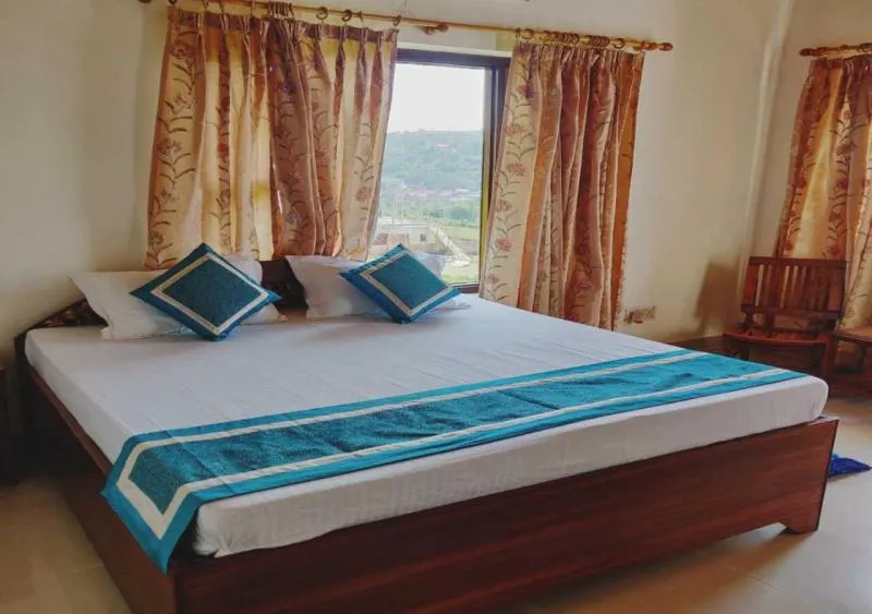 Bedroom in DEV COTTAGE AnD HOMESTAY