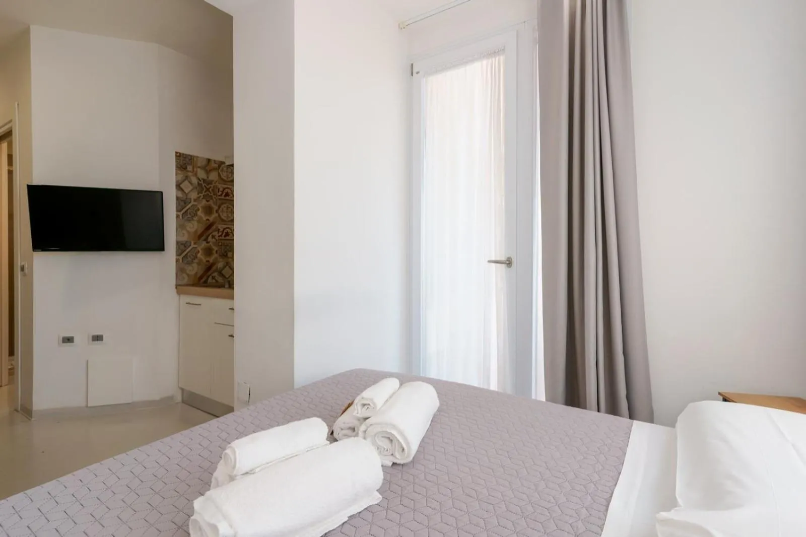 Bed in Lumiere Rooms - Eja Sardinia