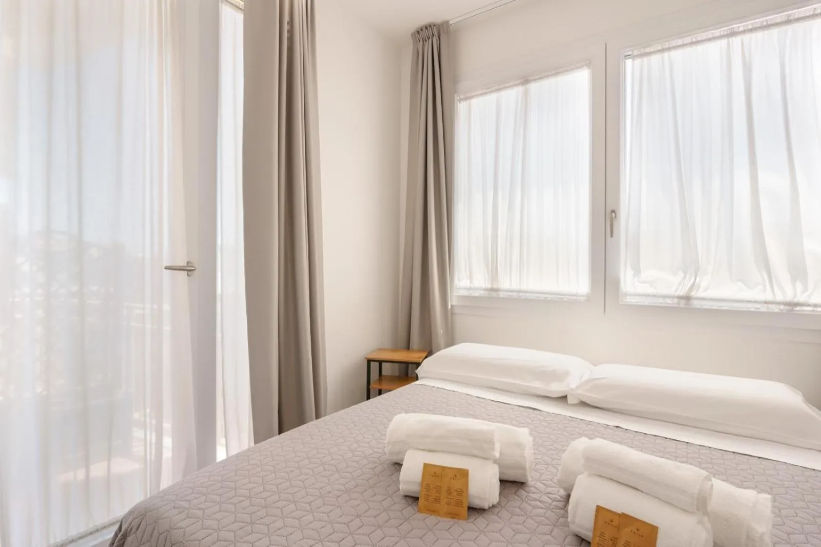 Bed in Lumiere Rooms - Eja Sardinia