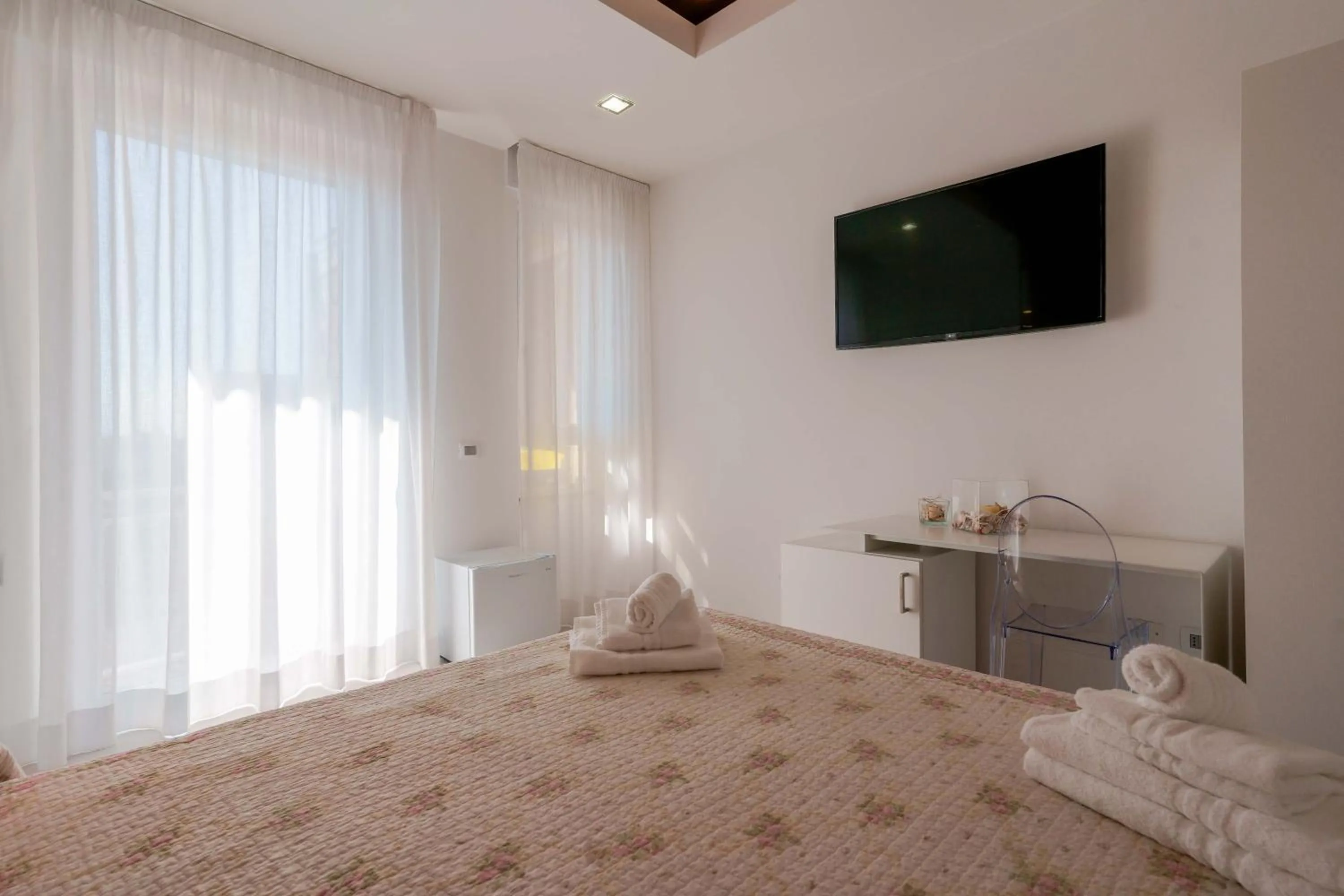 Bed in Lumiere Rooms - Eja Sardinia