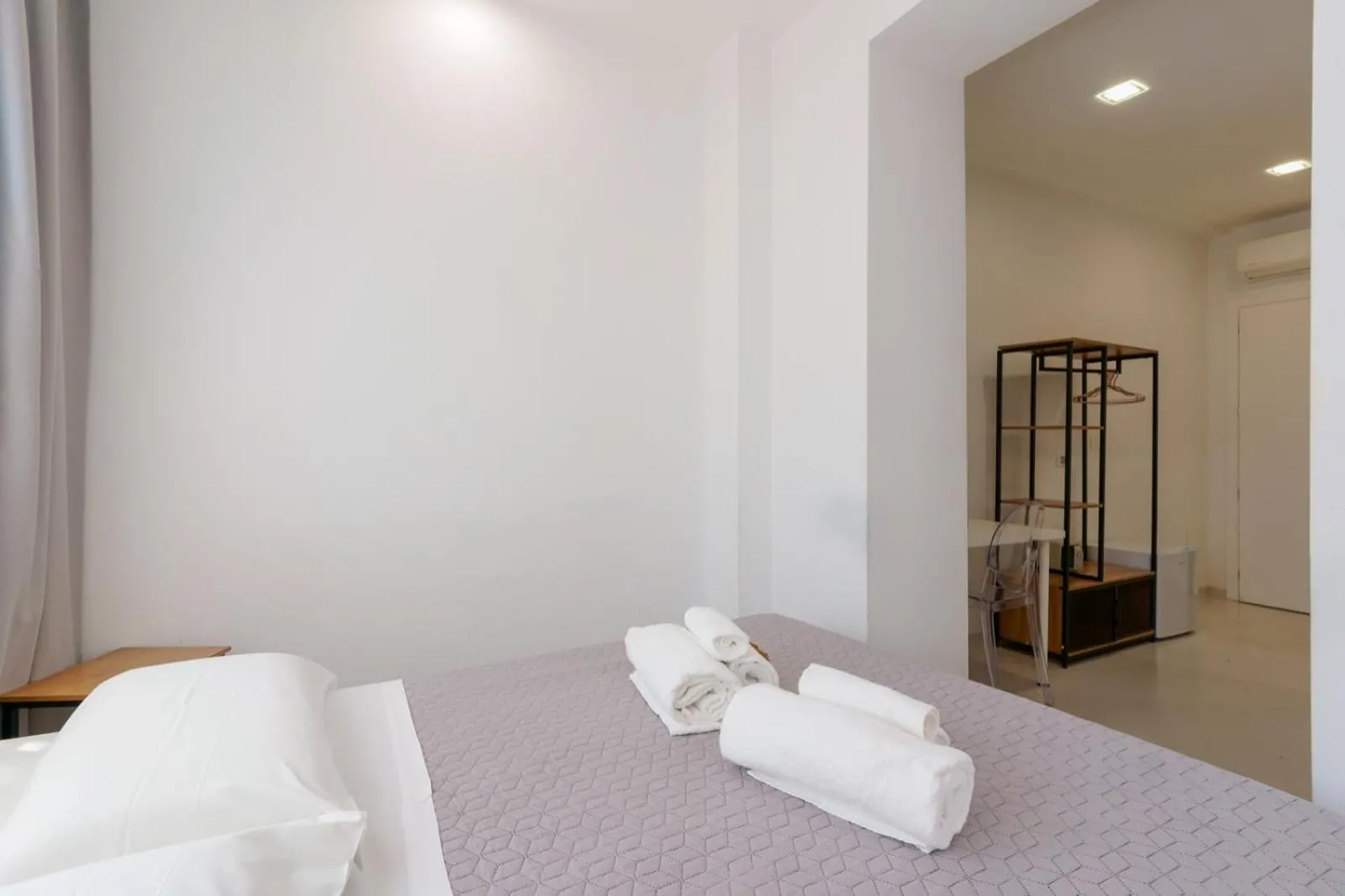 Bed in Lumiere Rooms - Eja Sardinia