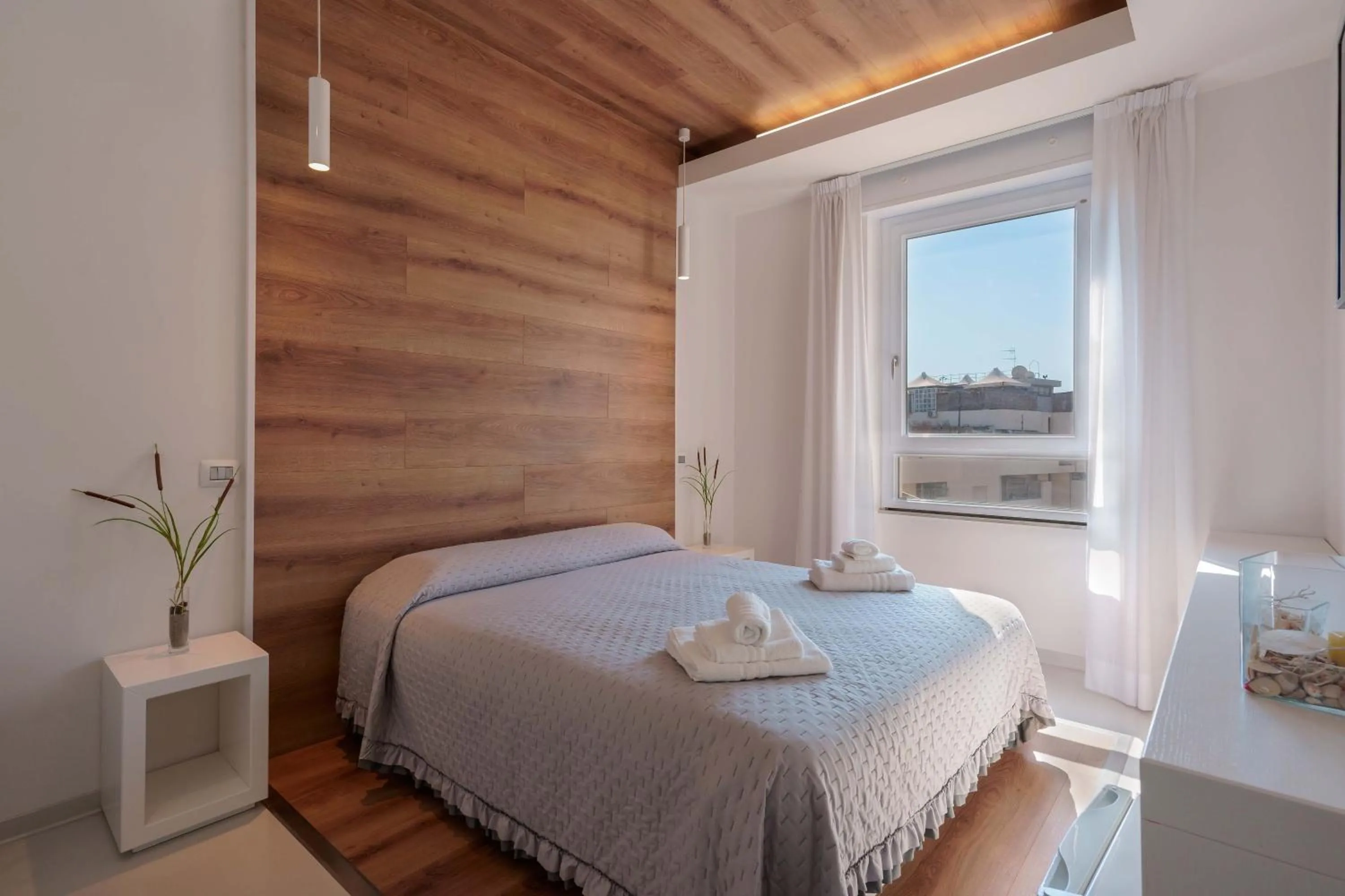 View (from property/room), Bed in Lumiere Rooms - Eja Sardinia