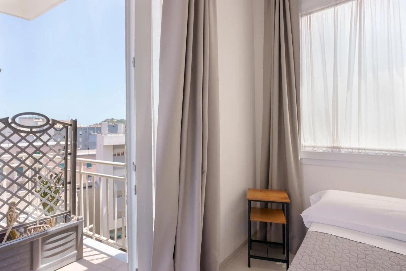 Bed in Lumiere Rooms - Eja Sardinia