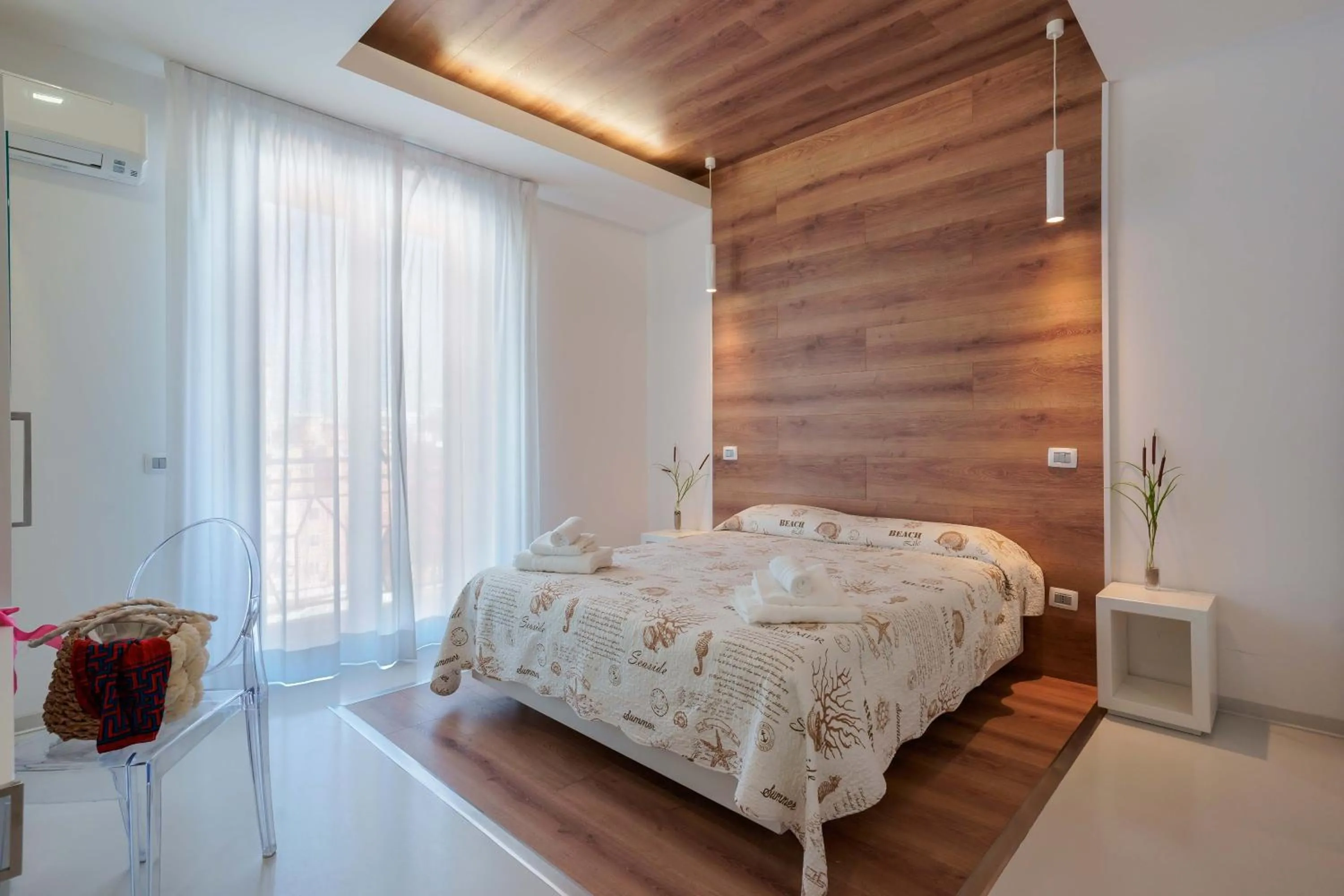 Bed in Lumiere Rooms - Eja Sardinia