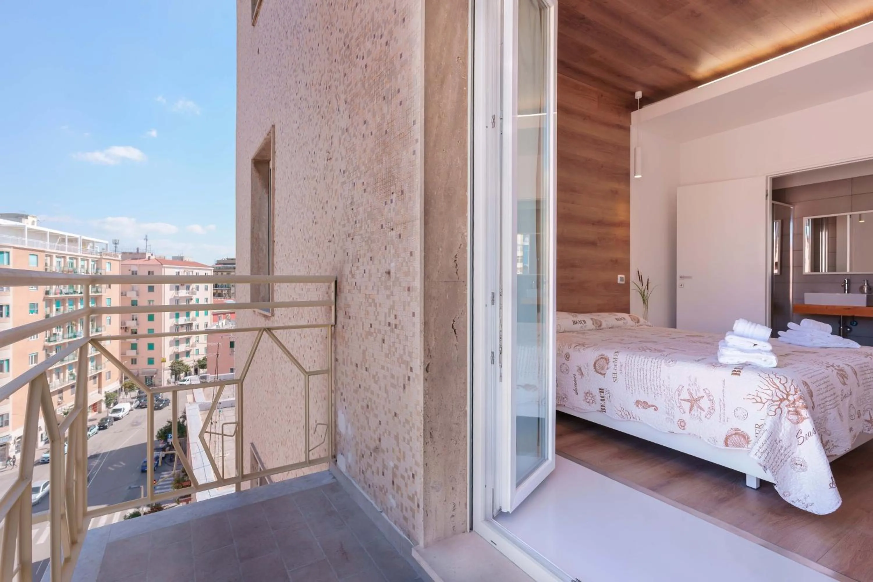 Bed in Lumiere Rooms - Eja Sardinia