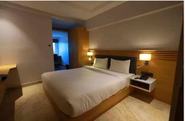 Bedroom in LUXUS INN