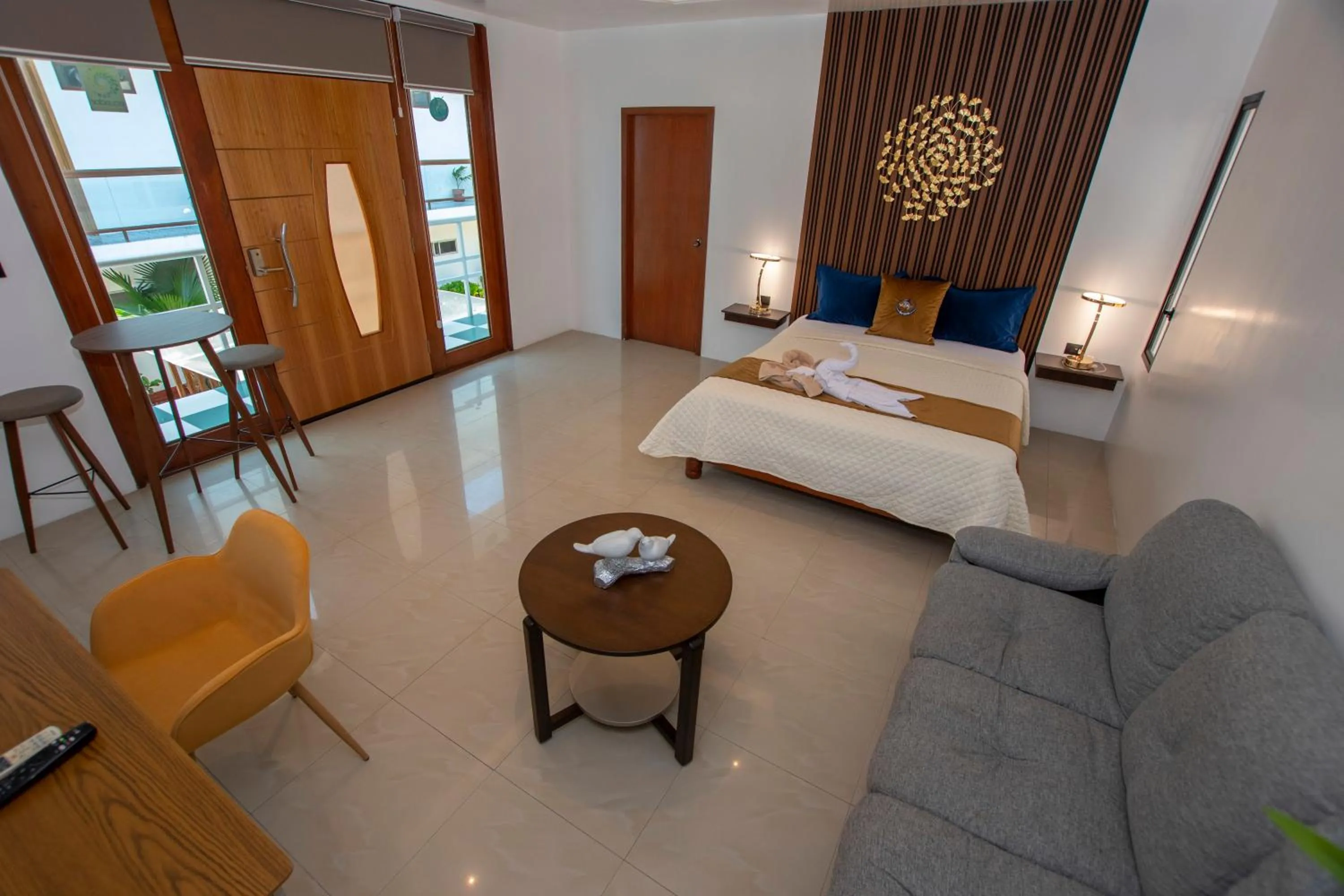 Bed in Blue Marlin Galápagos, Hotel & SPA