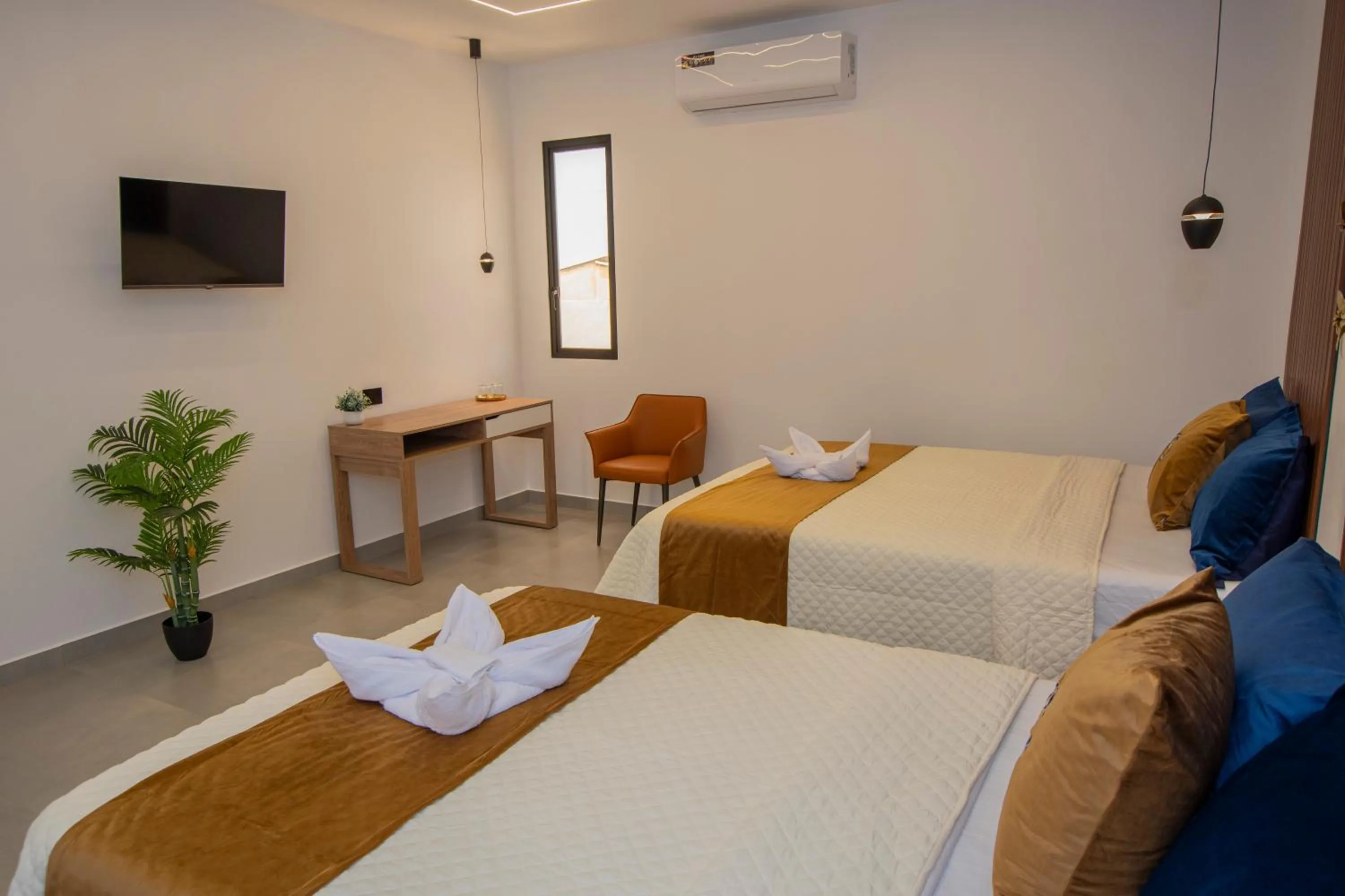 Bed in Blue Marlin Galápagos, Hotel & SPA