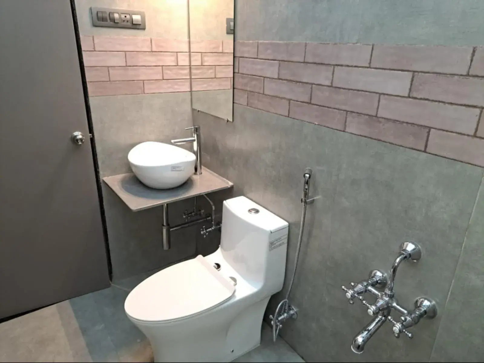 Bathroom in Sai Celebrations Inn Shirdi Bathroom in Sai Celebrations Inn Shirdi