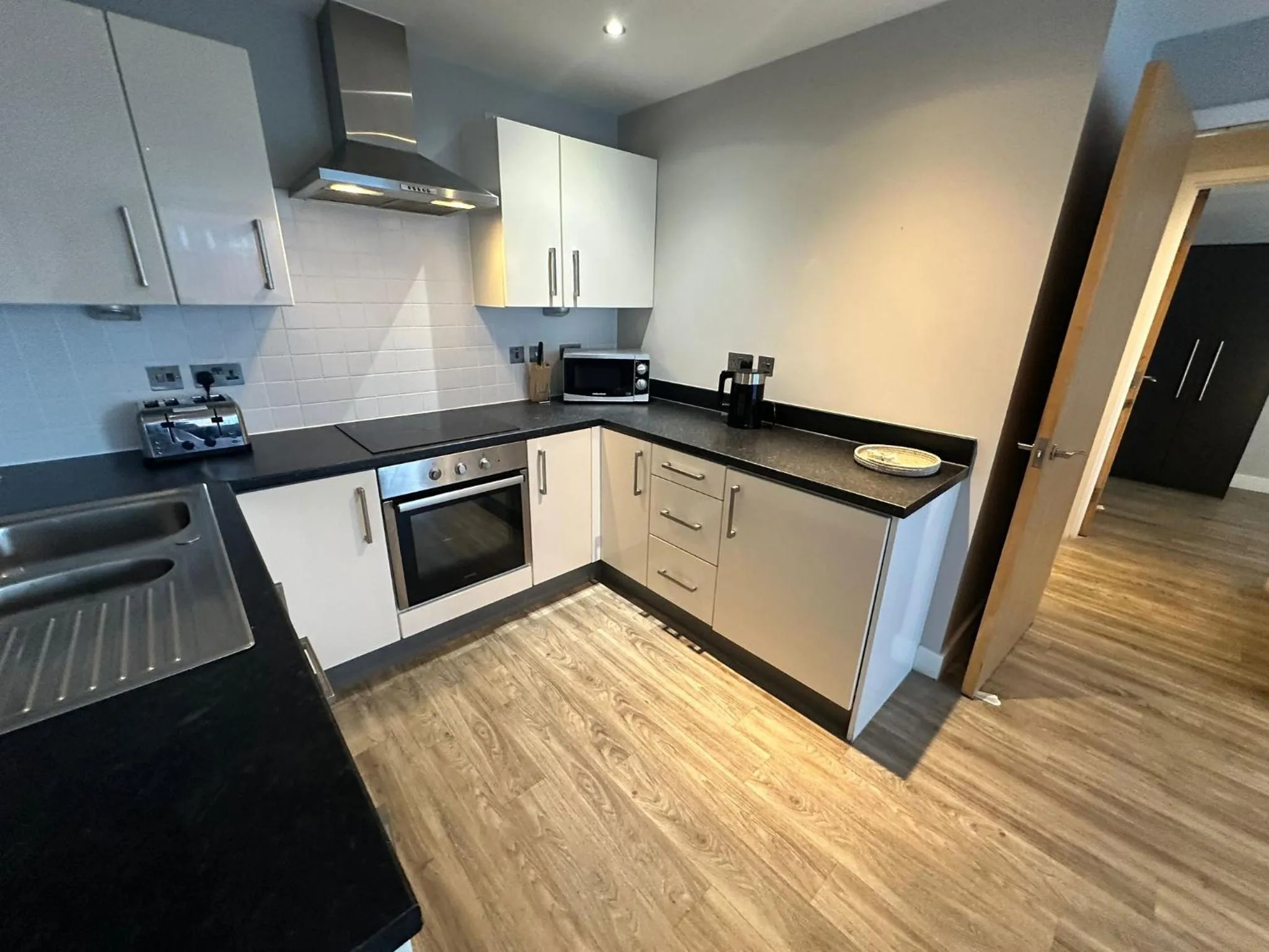 Kitchen or kitchenette in Obel Apartments by Beehosting