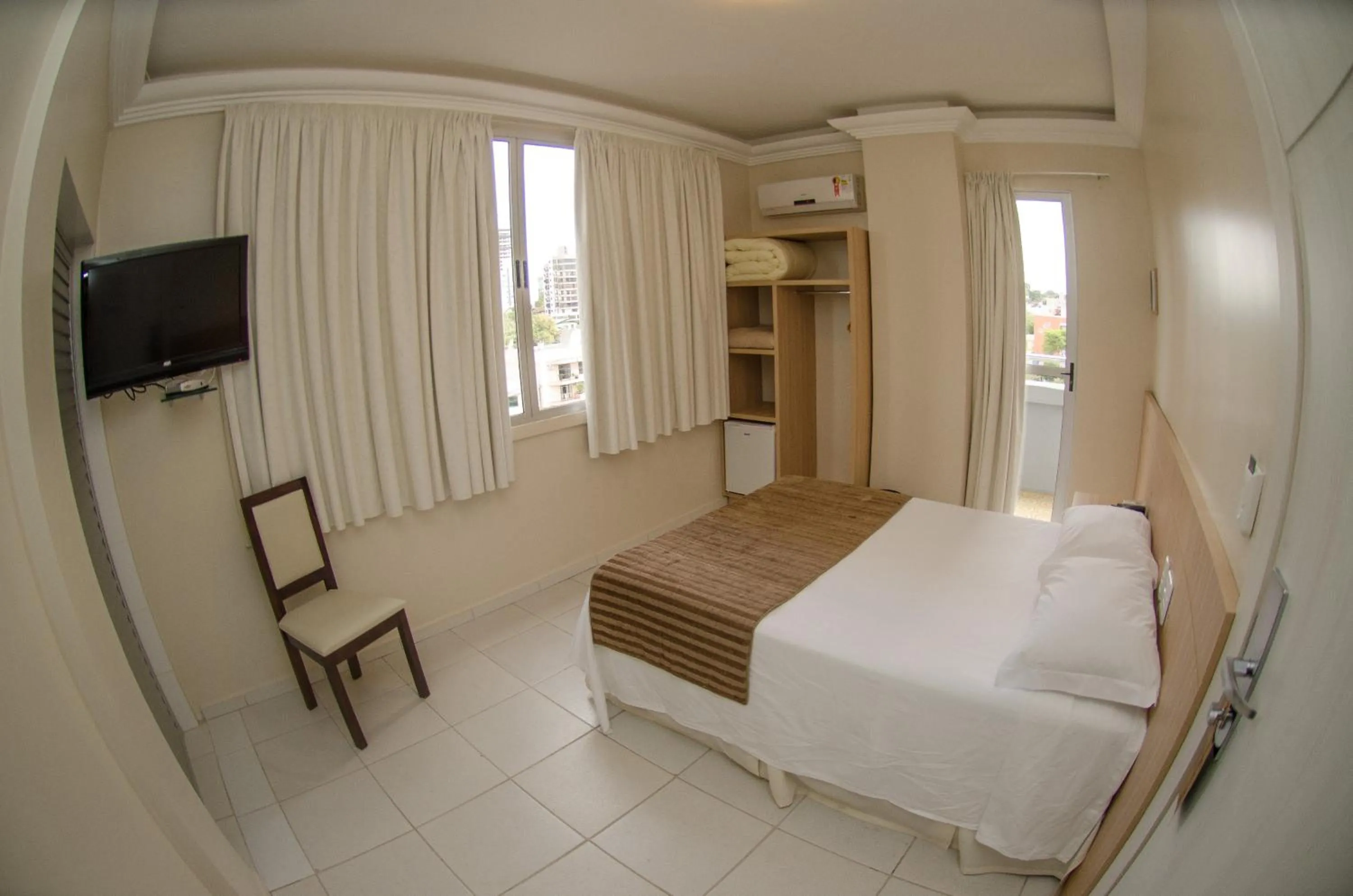 TV and multimedia, Bed in Hotel Desbravador