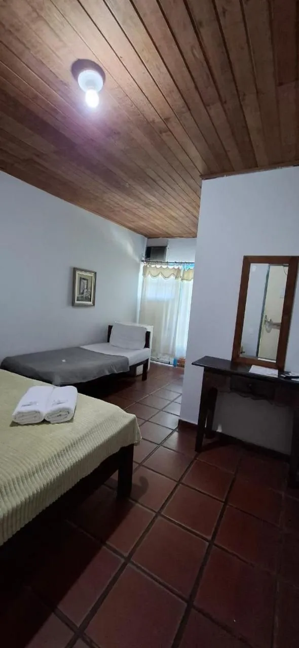 Bed in Pousada das Tartarugas