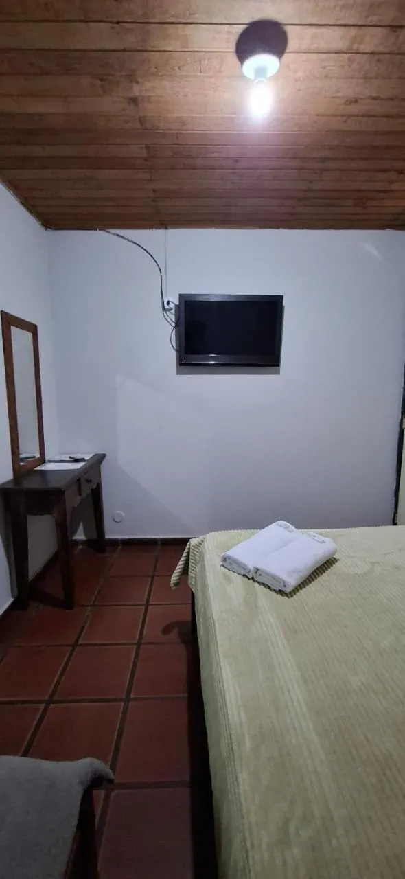 Bed in Pousada das Tartarugas