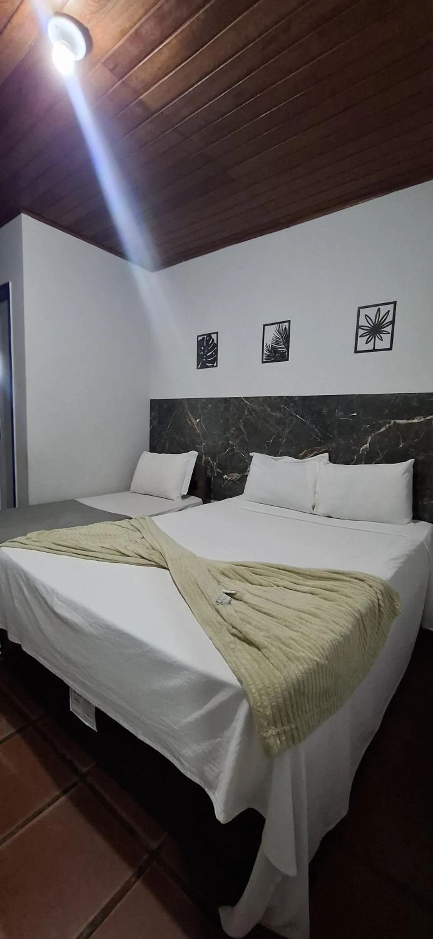 Bed in Pousada das Tartarugas