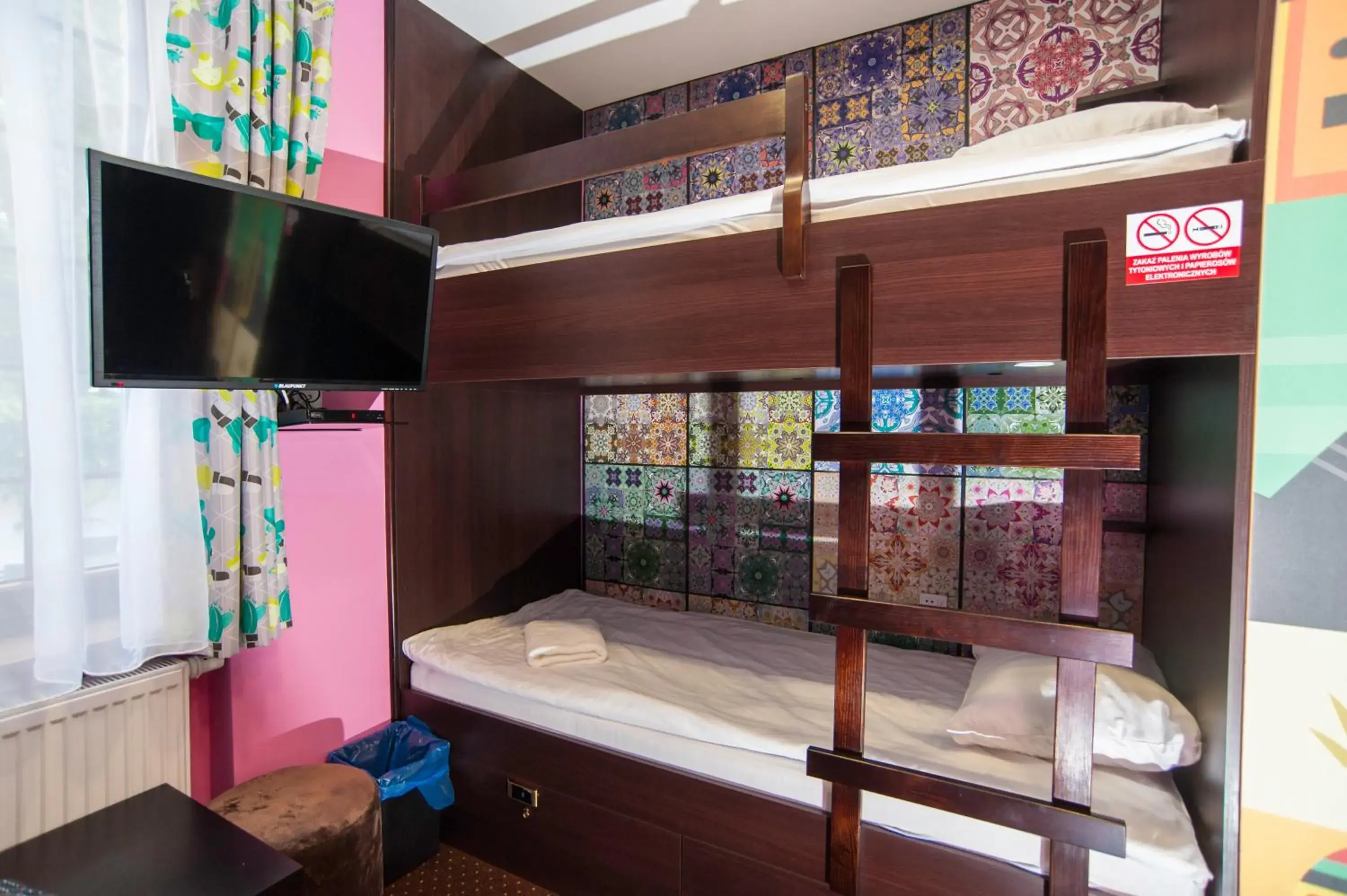 Bed in 4-Bed Mixed Dormitory Room in World Hostel - Old Town Bed in 4-Bed Mixed Dormitory Room in World Hostel - Old Town