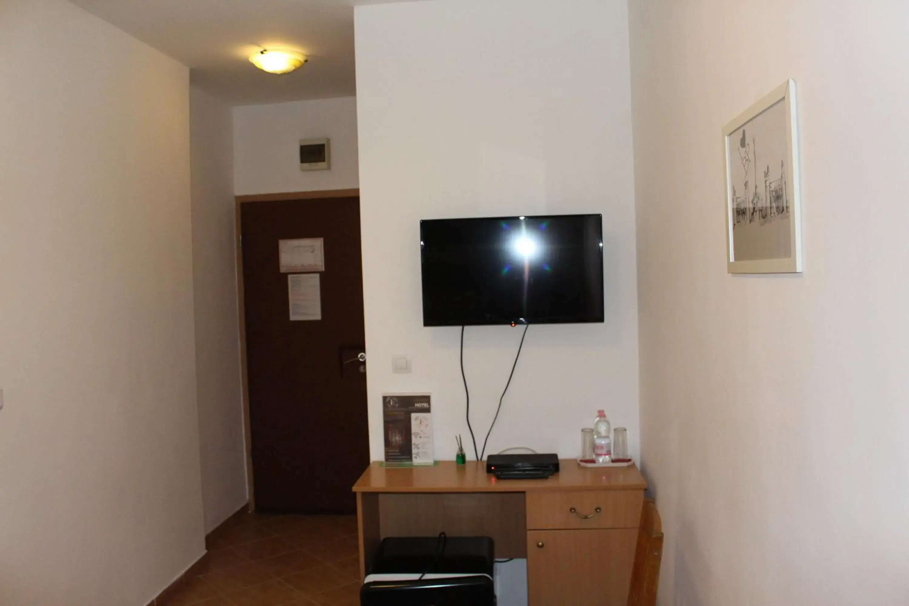 TV and multimedia, TV/Entertainment Center in Esprit Hotel