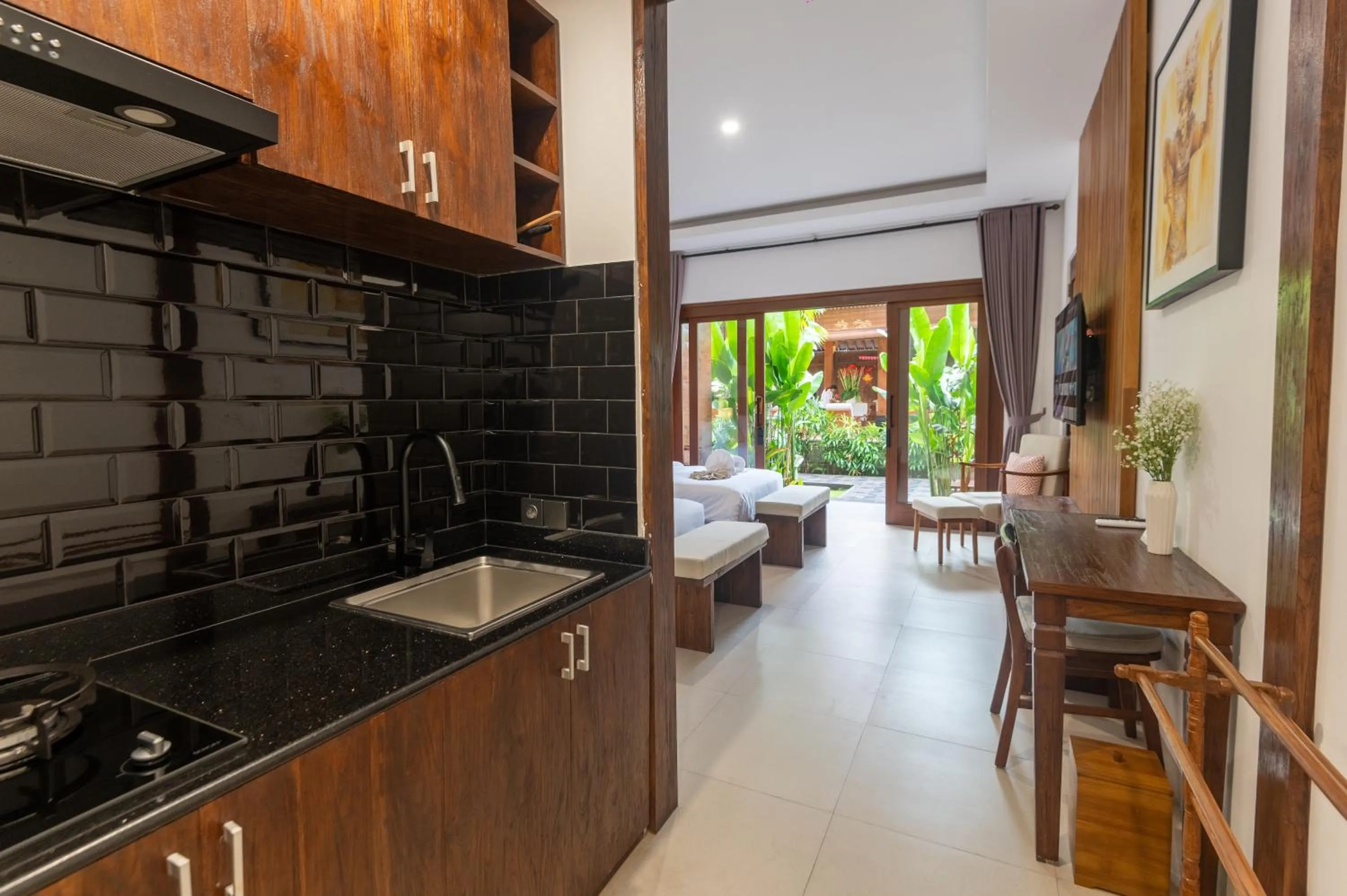 Kitchen or kitchenette in Griya Shanti Suites