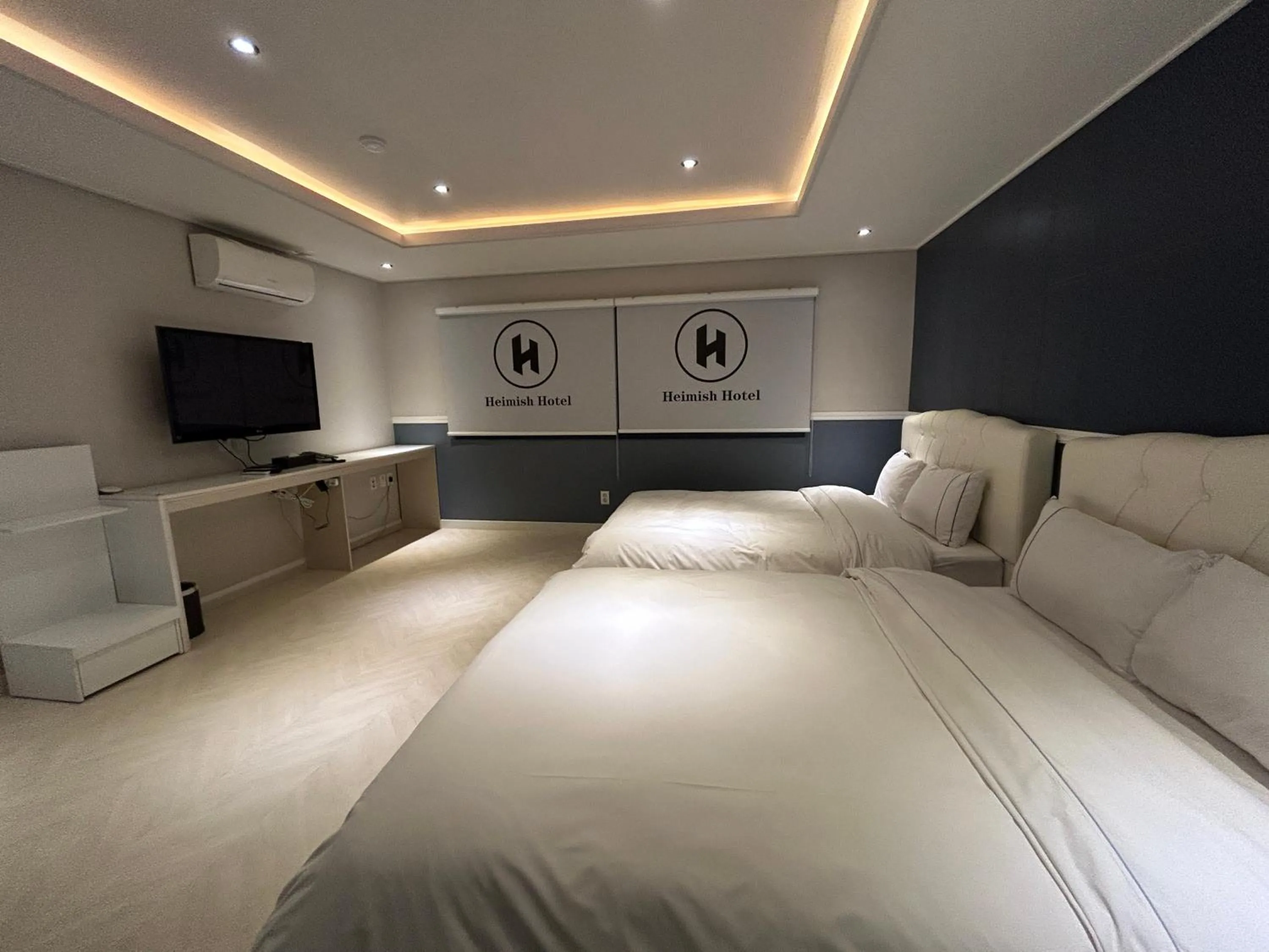 Bed in Heimish Hotel