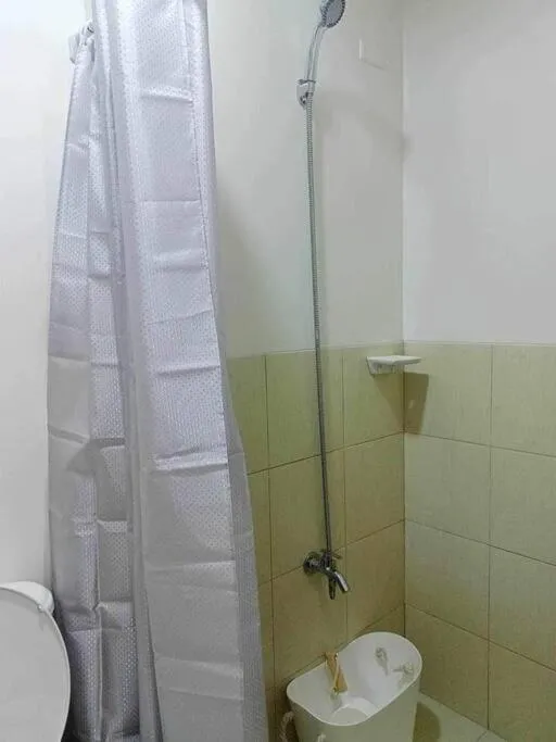 Toilet in Chelsea Suite's Esthetic Staycation at Trees Residence QC