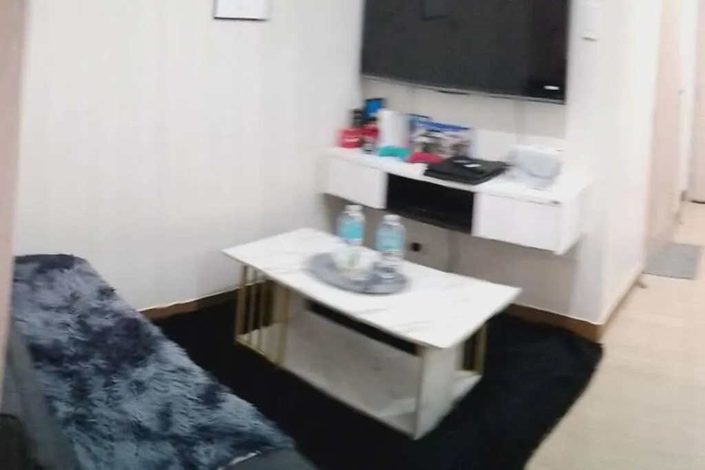 Living room in Chelsea Suite's Esthetic Staycation at Trees Residence QC