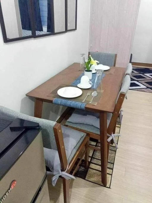 Dining area in Chelsea Suite's Esthetic Staycation at Trees Residence QC