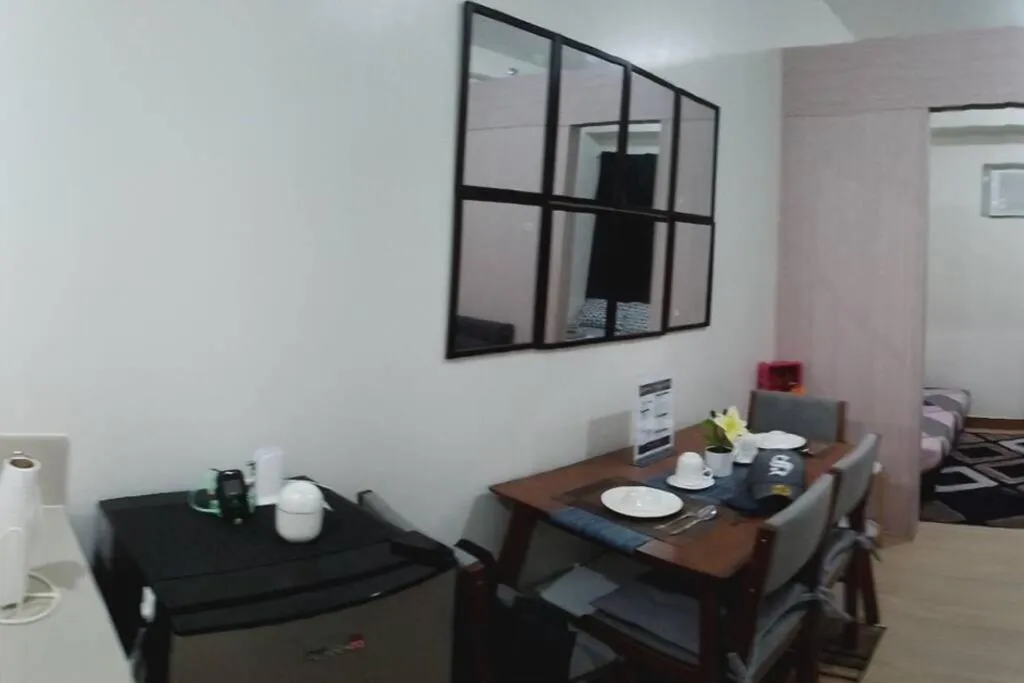 Dining area in Chelsea Suite's Esthetic Staycation at Trees Residence QC