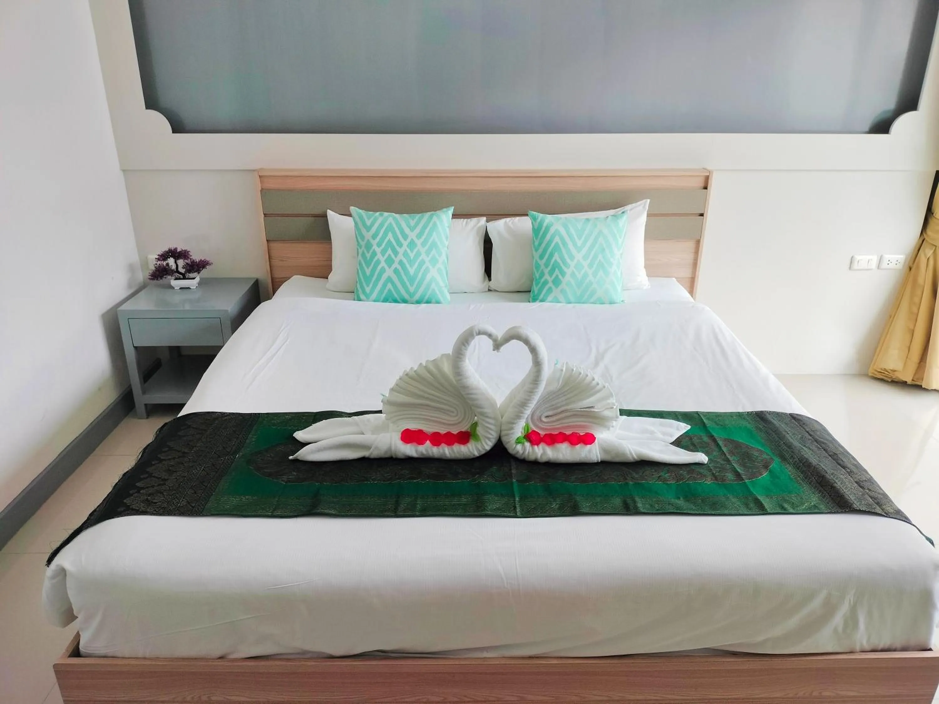 Bedroom, Bed in T & C Hotel Patong Beach