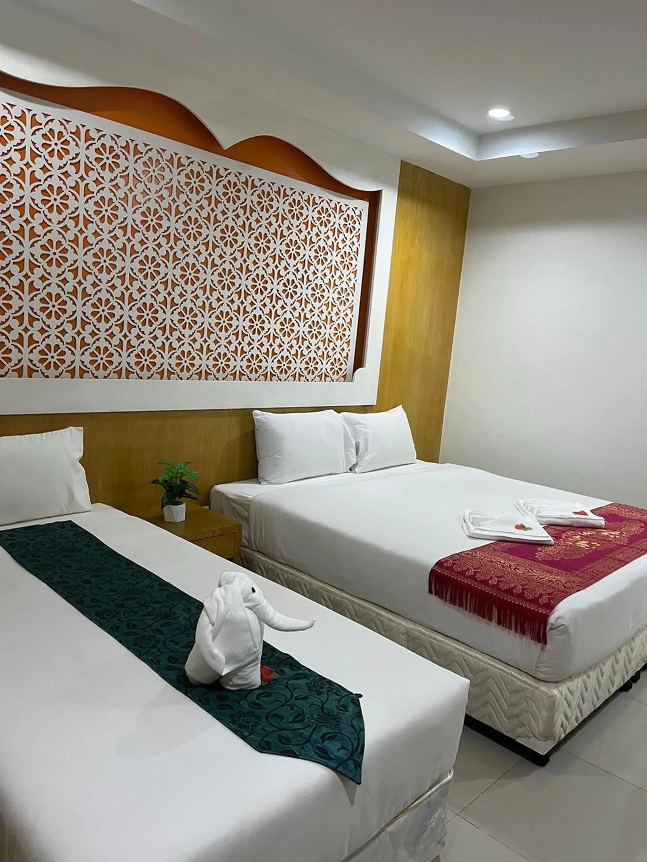 Bedroom, Bed in T & C Hotel Patong Beach Bedroom, Bed in T & C Hotel Patong Beach