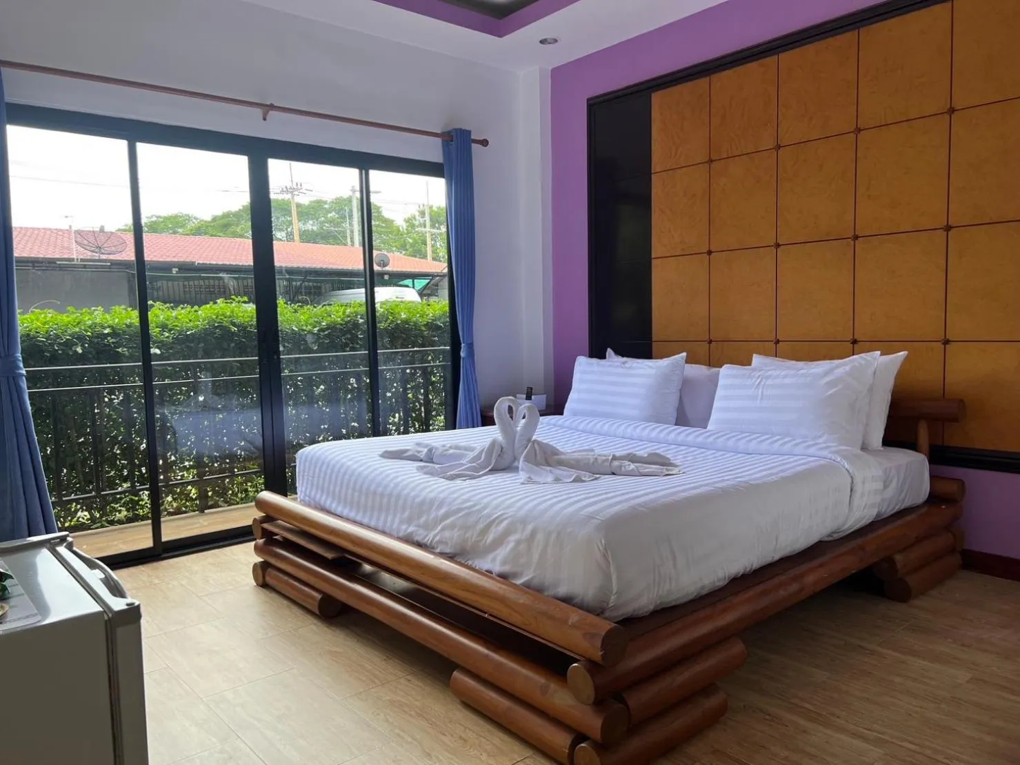 Bed in Kan Home Hotel