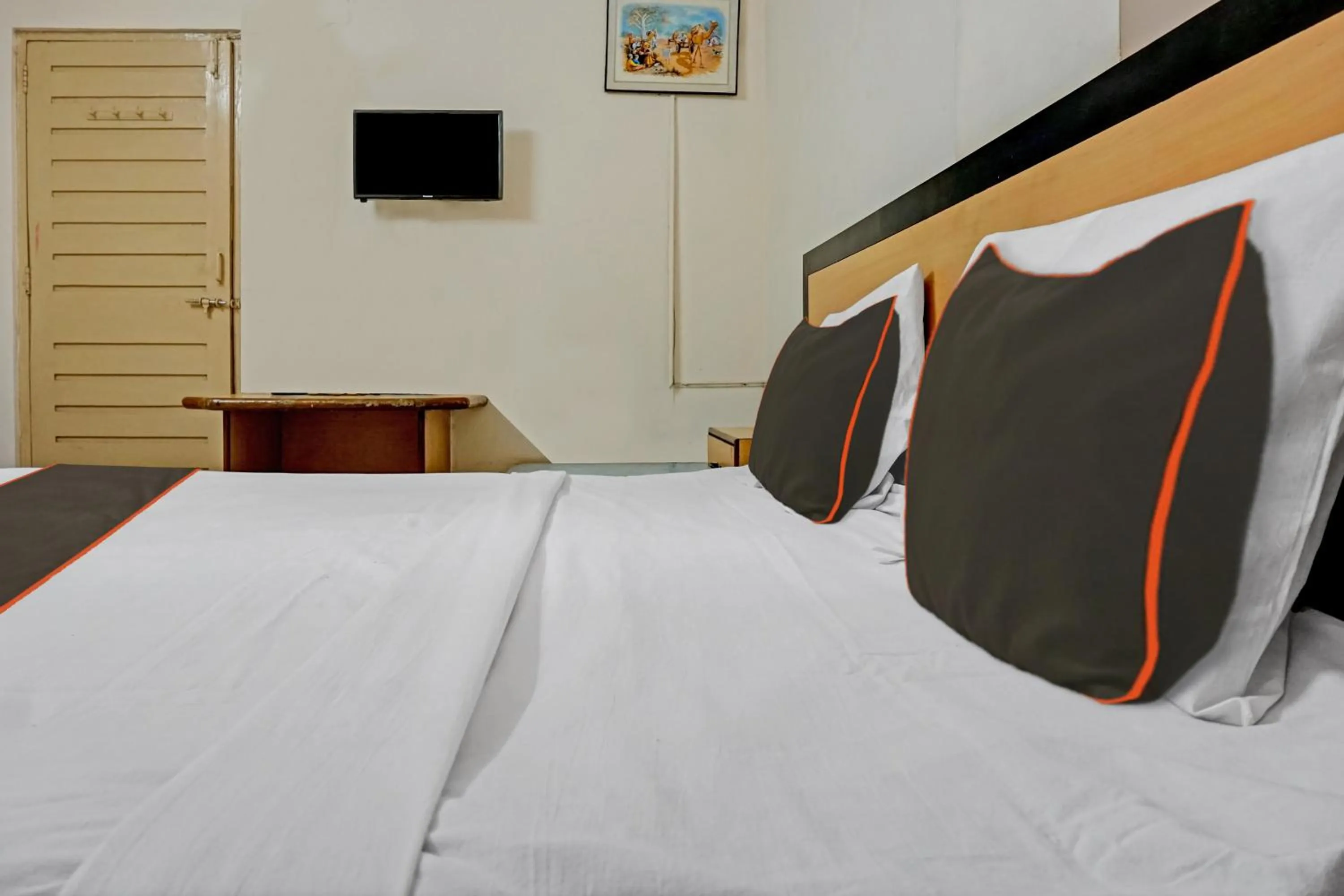 Bedroom in Hotel O Thakkar Lodge