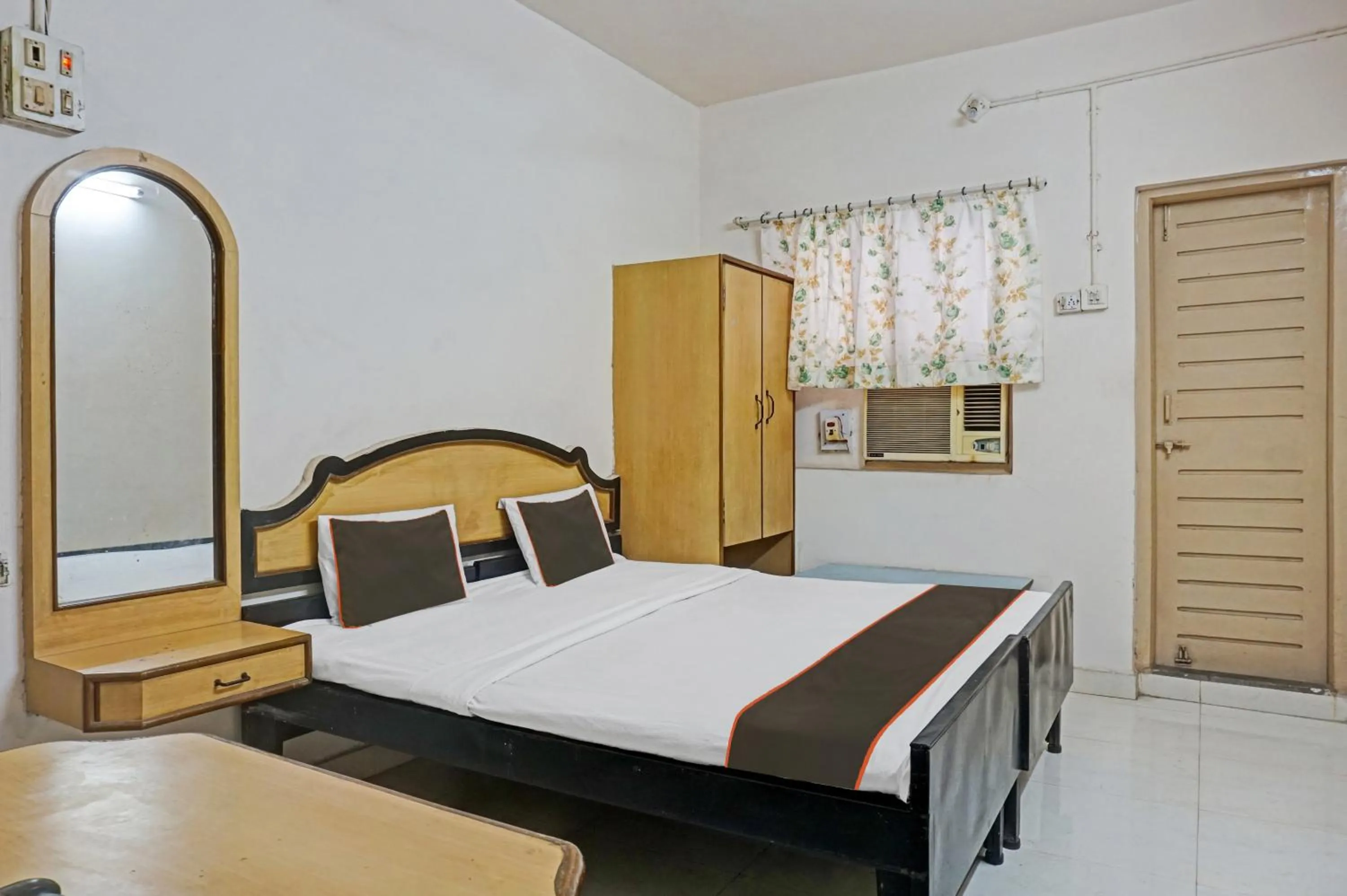 Bedroom in Hotel O Thakkar Lodge