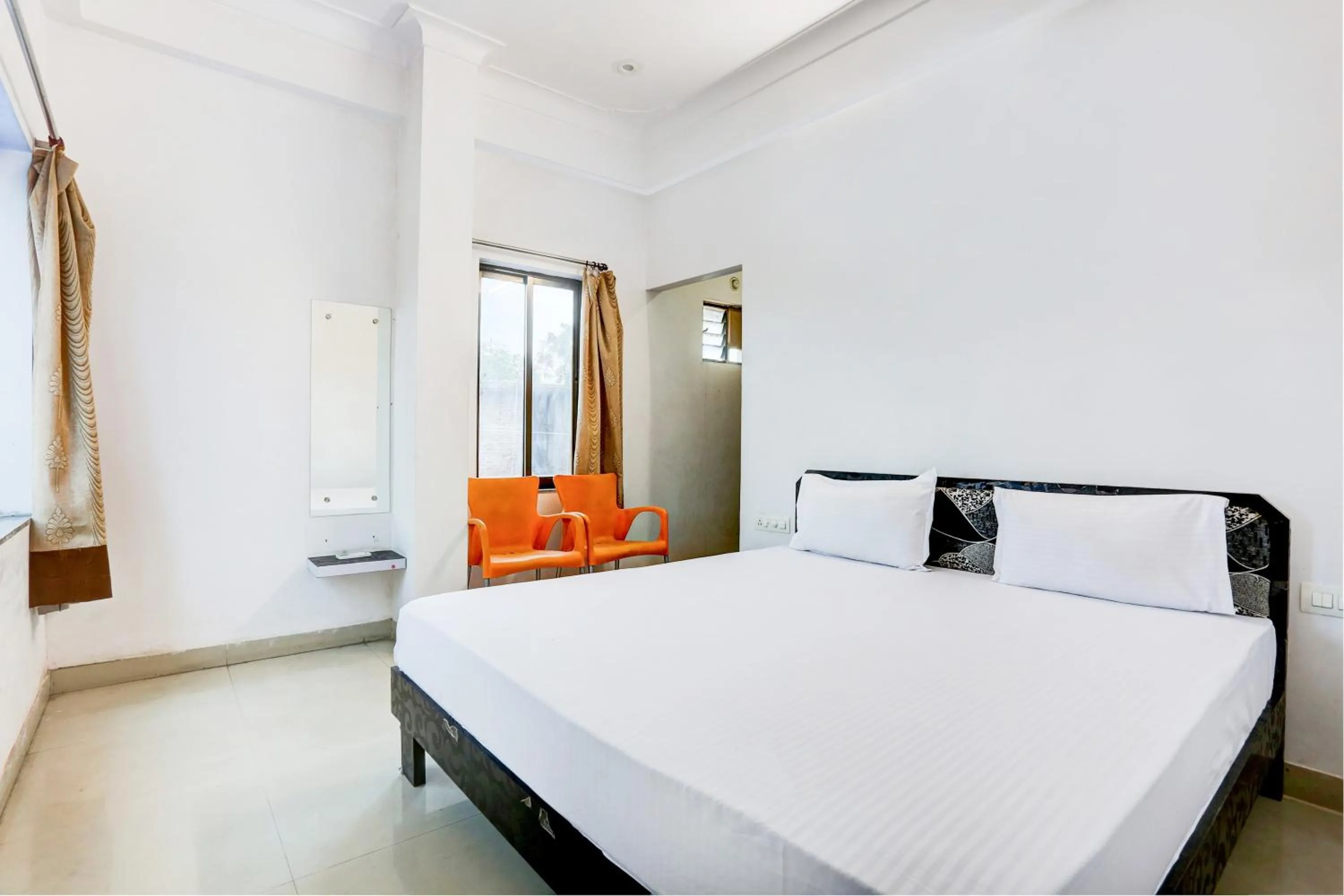 Bedroom in Super Hotel O Goverdhan Villa